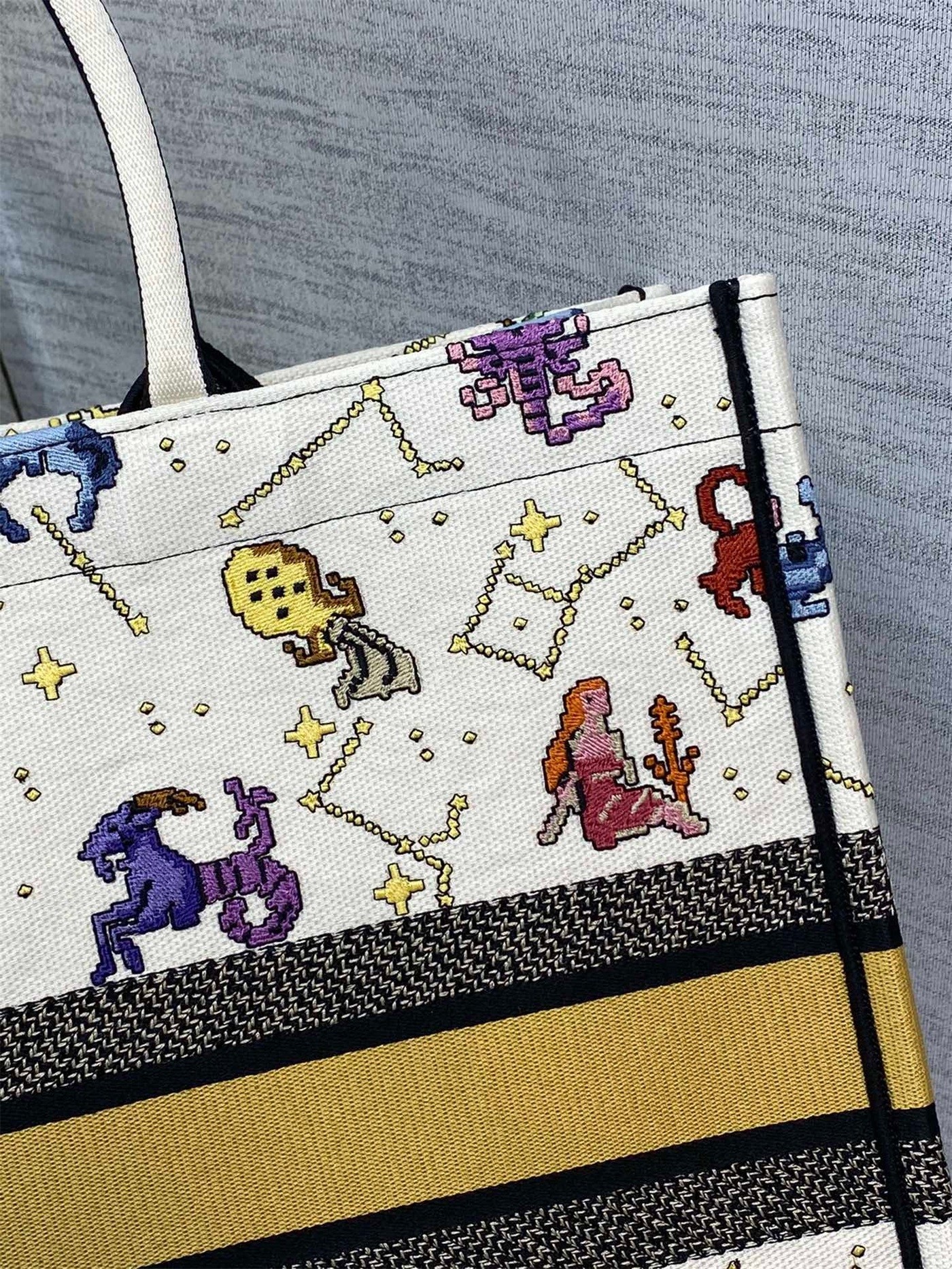D*or large book tote bag in white pixel zodiac embroidery
