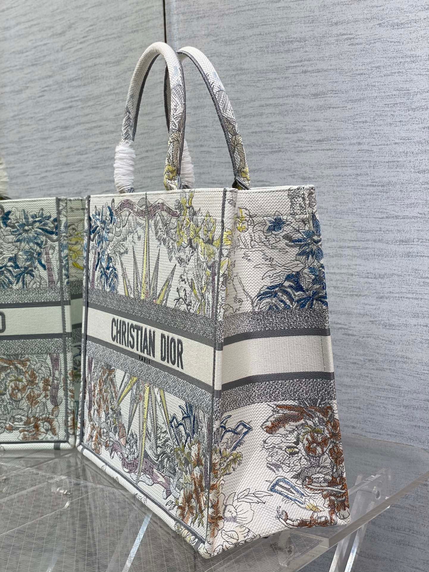 D*or large D*or book tote in white multicolor rêve d