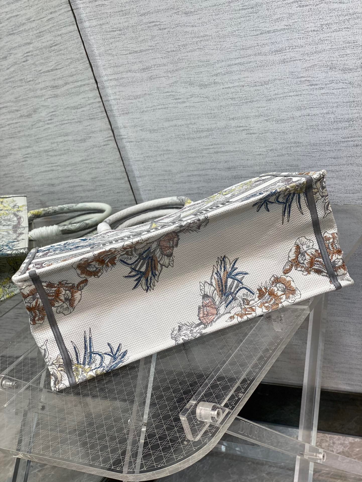 D*or large D*or book tote in white multicolor rêve d