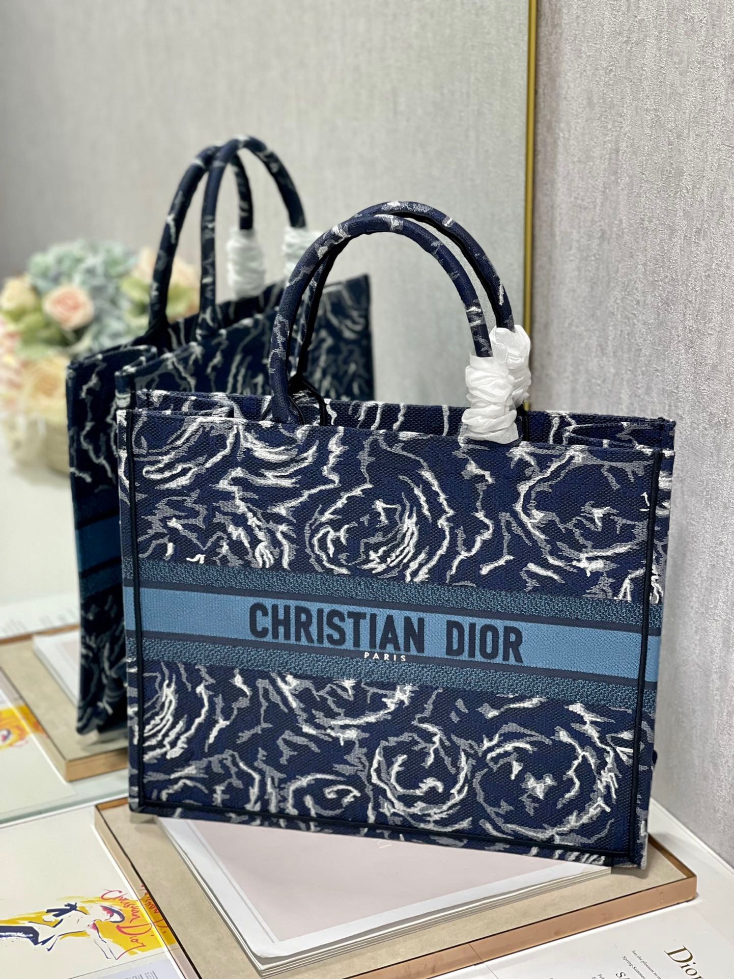 D*or large book tote in blue D*or roses embroidery