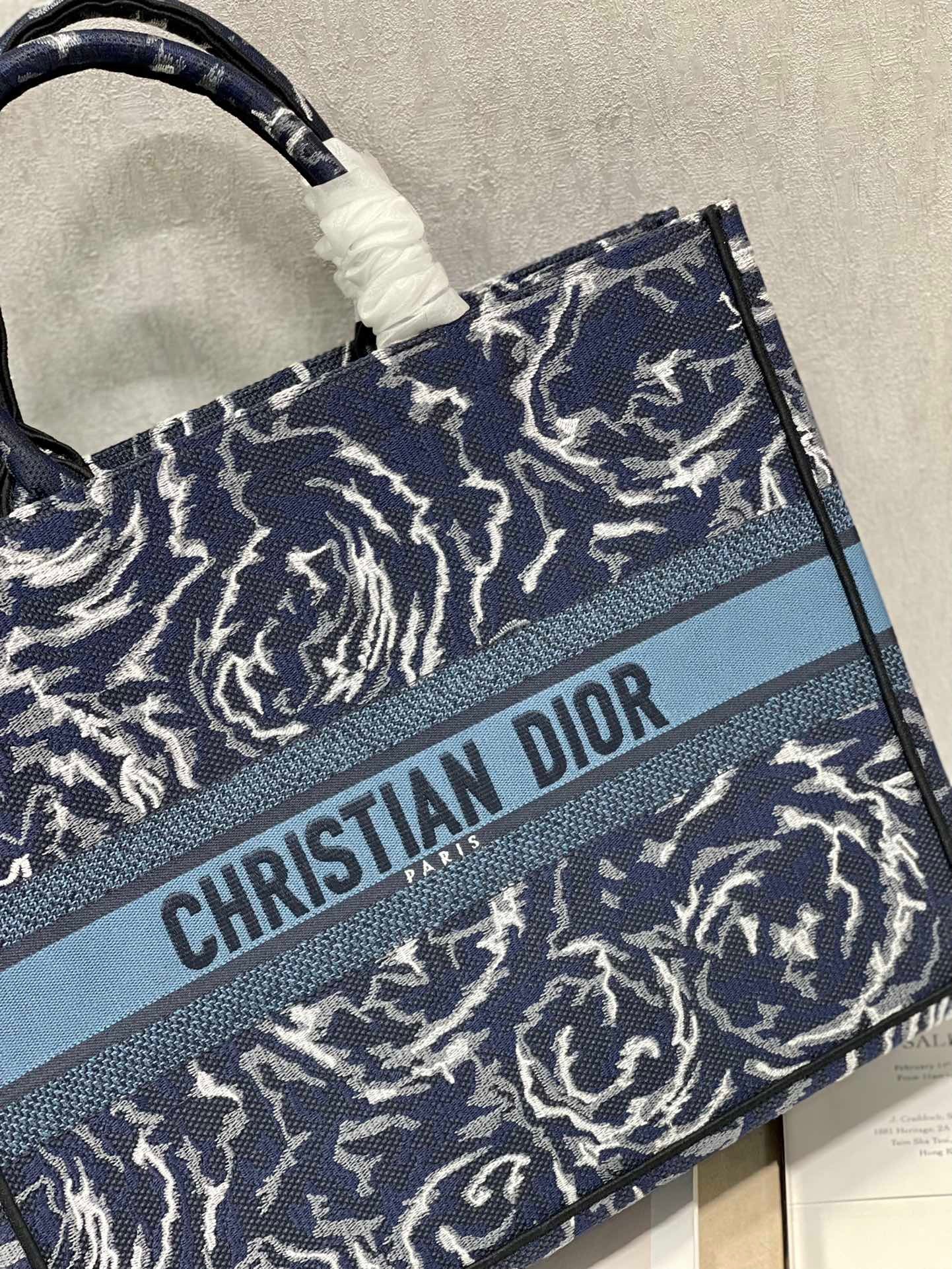 D*or large book tote in blue D*or roses embroidery