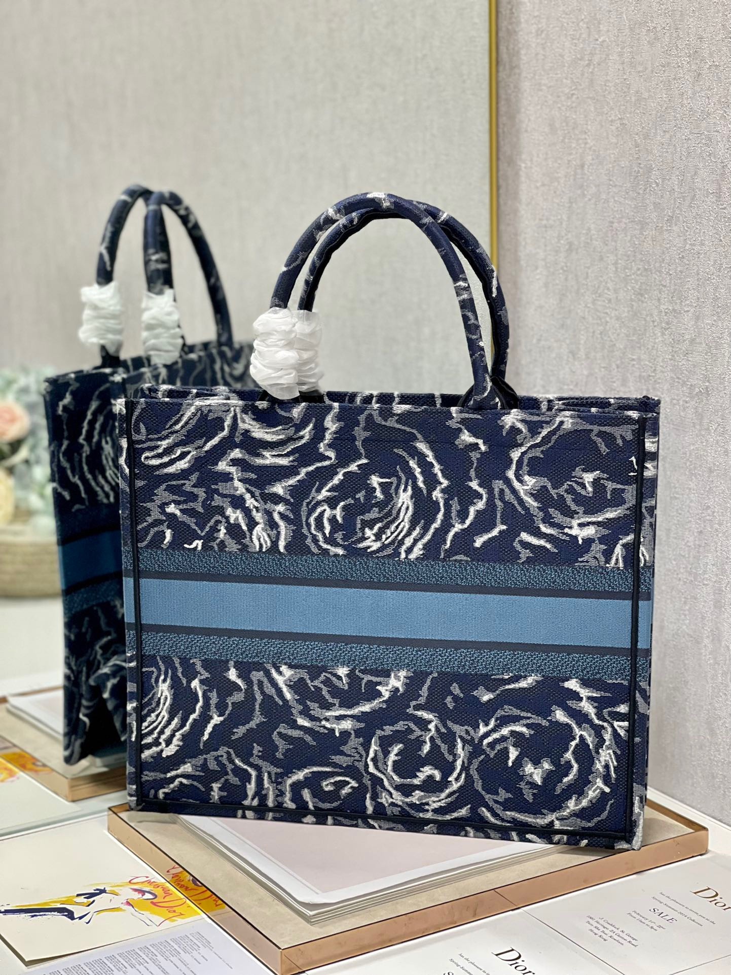 D*or large book tote in blue D*or roses embroidery