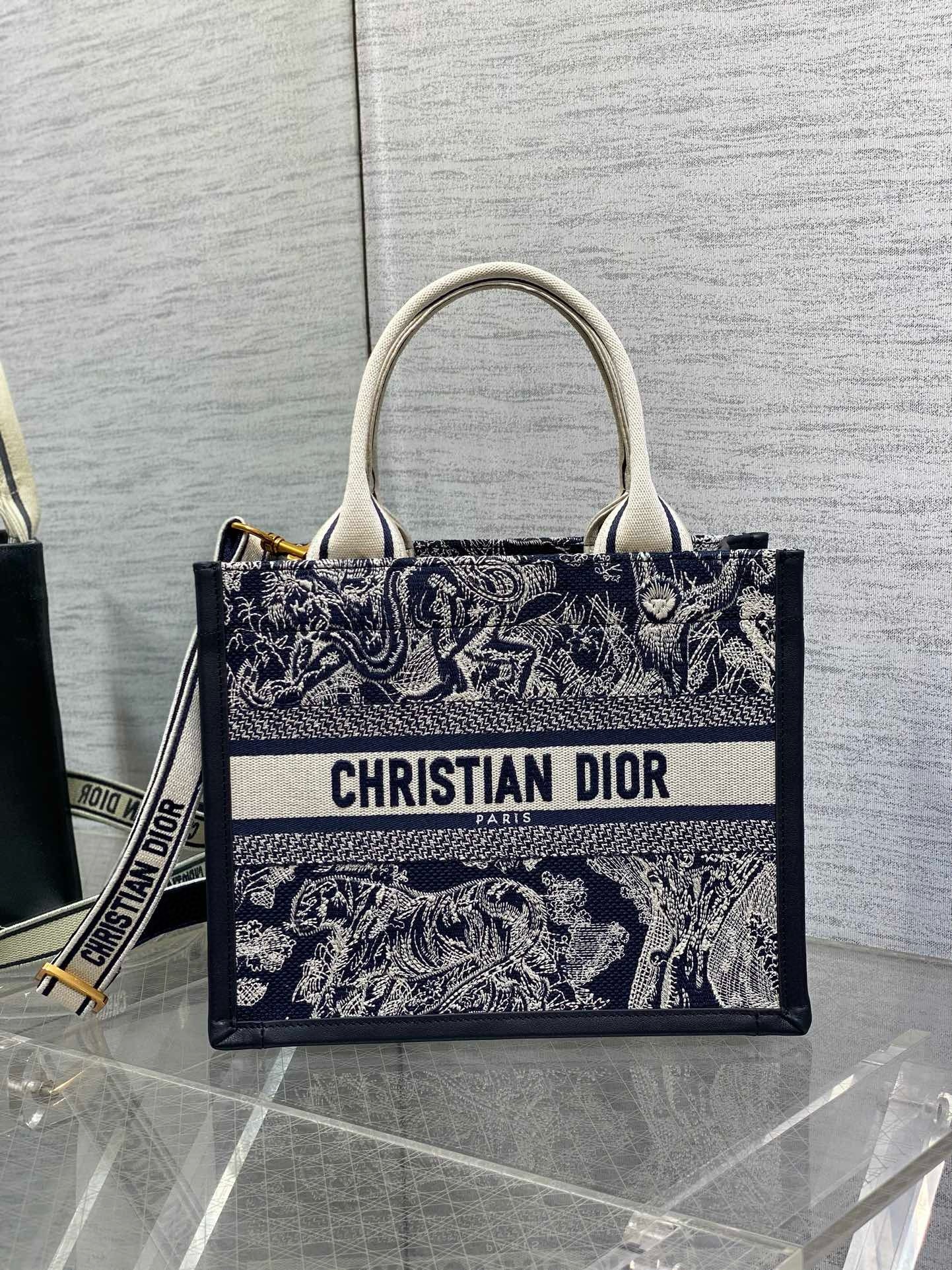 D*or medium book tote bag with strap in toile de jouy reverse embroidery