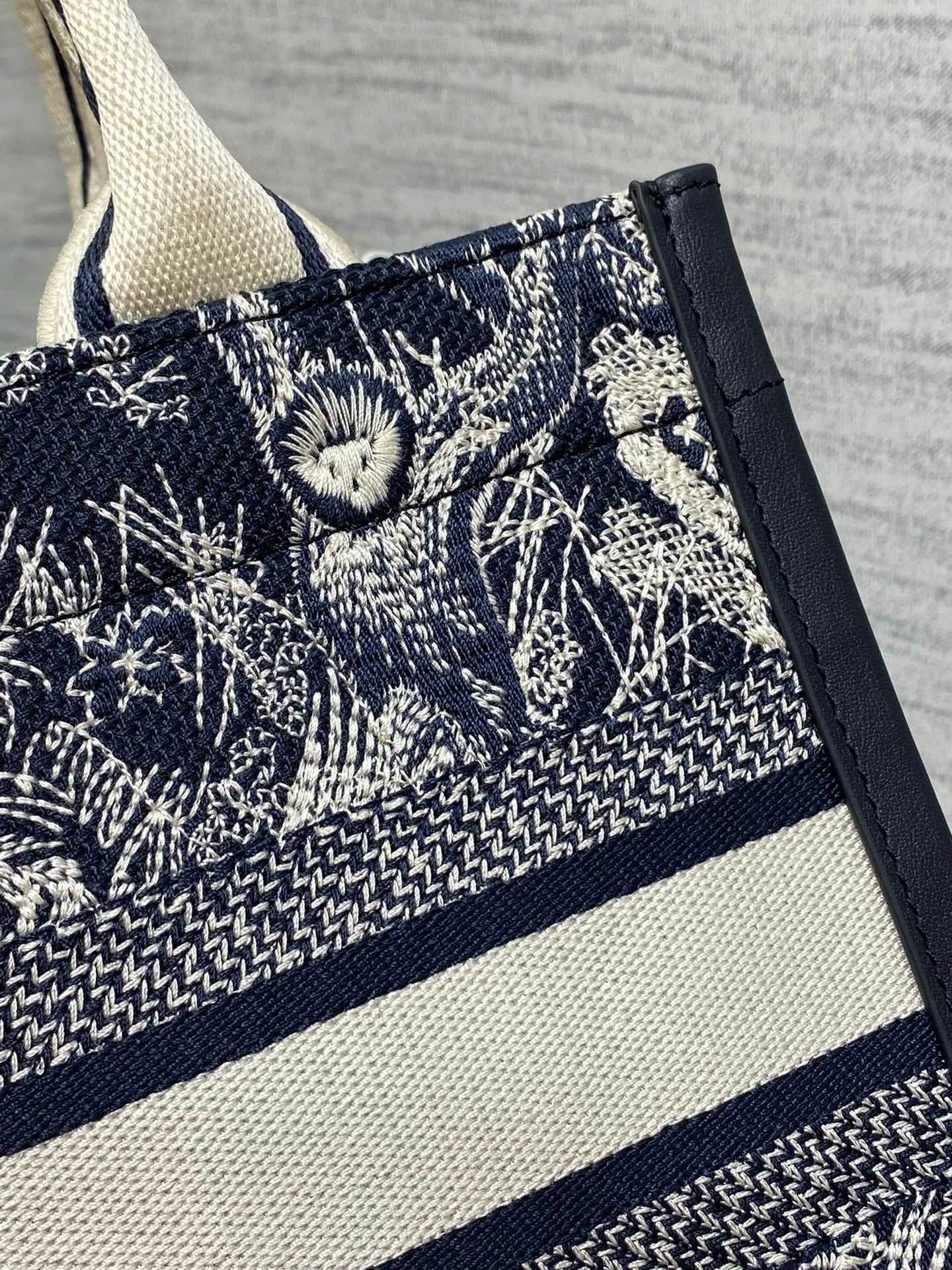 D*or medium book tote bag with strap in toile de jouy reverse embroidery