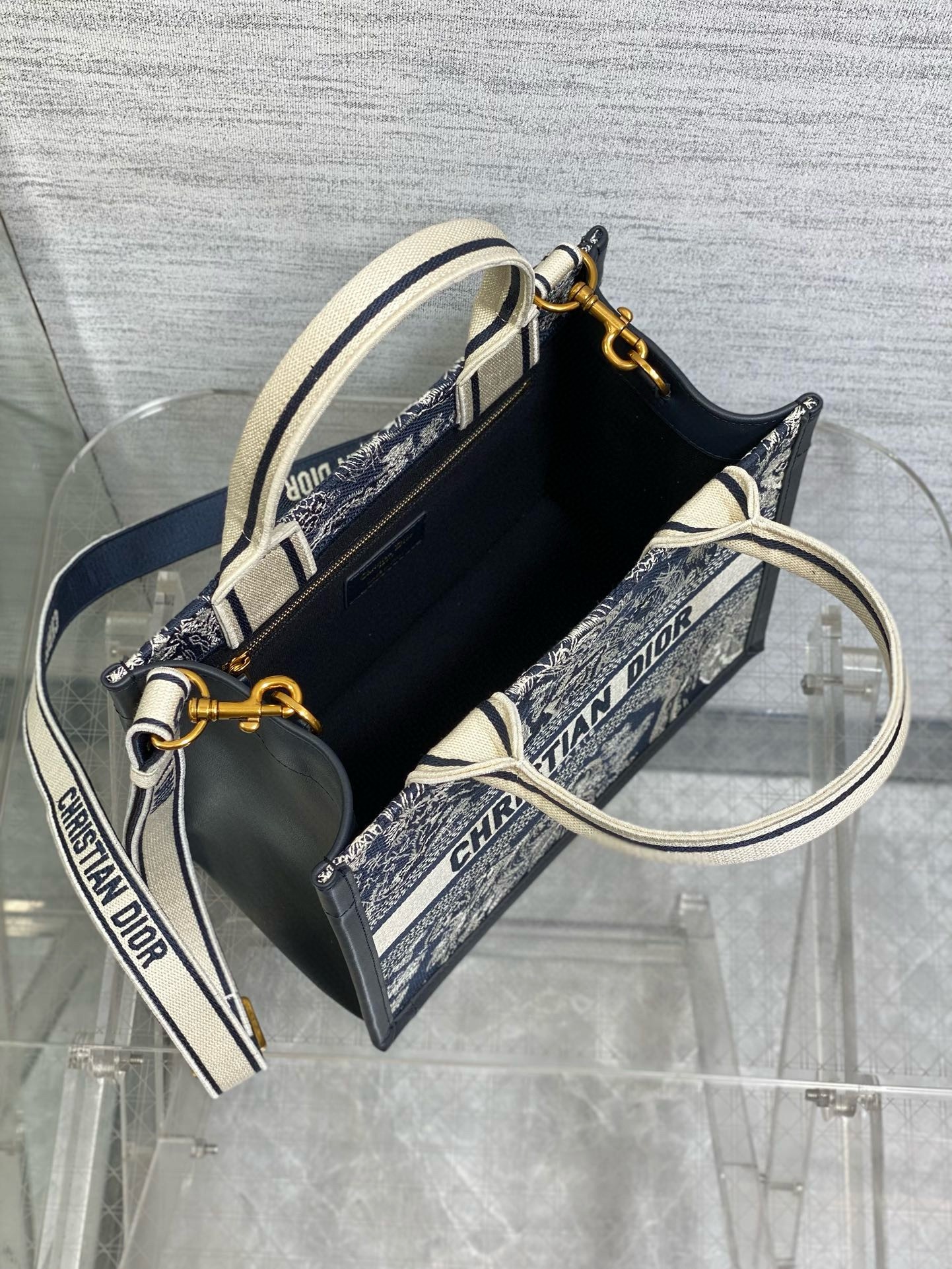 D*or medium book tote bag with strap in toile de jouy reverse embroidery