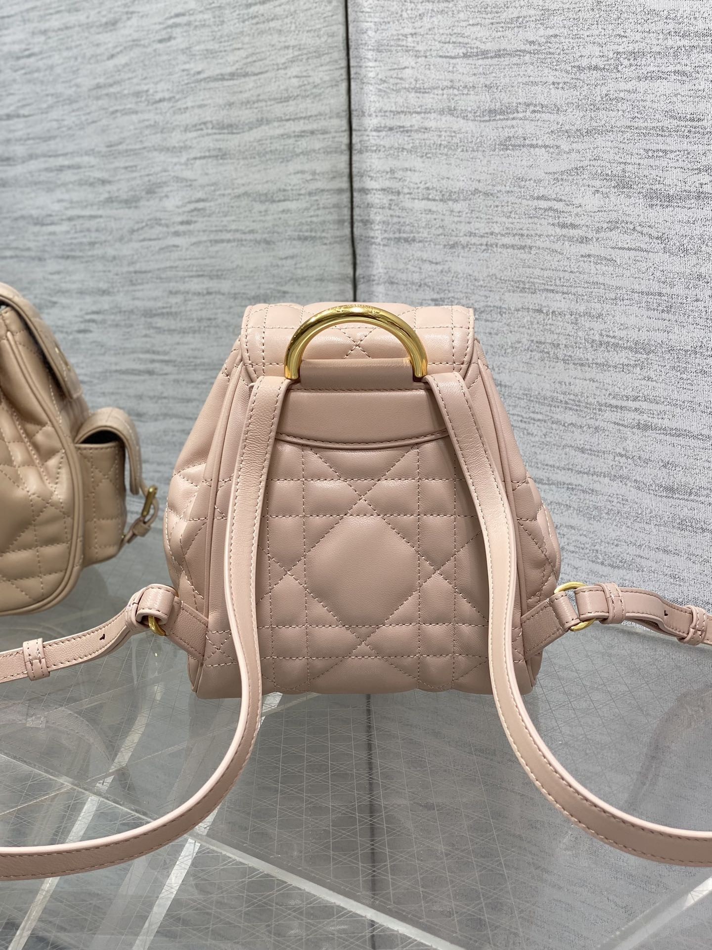 D*or caro small backpack in pink macrocannage lambskin