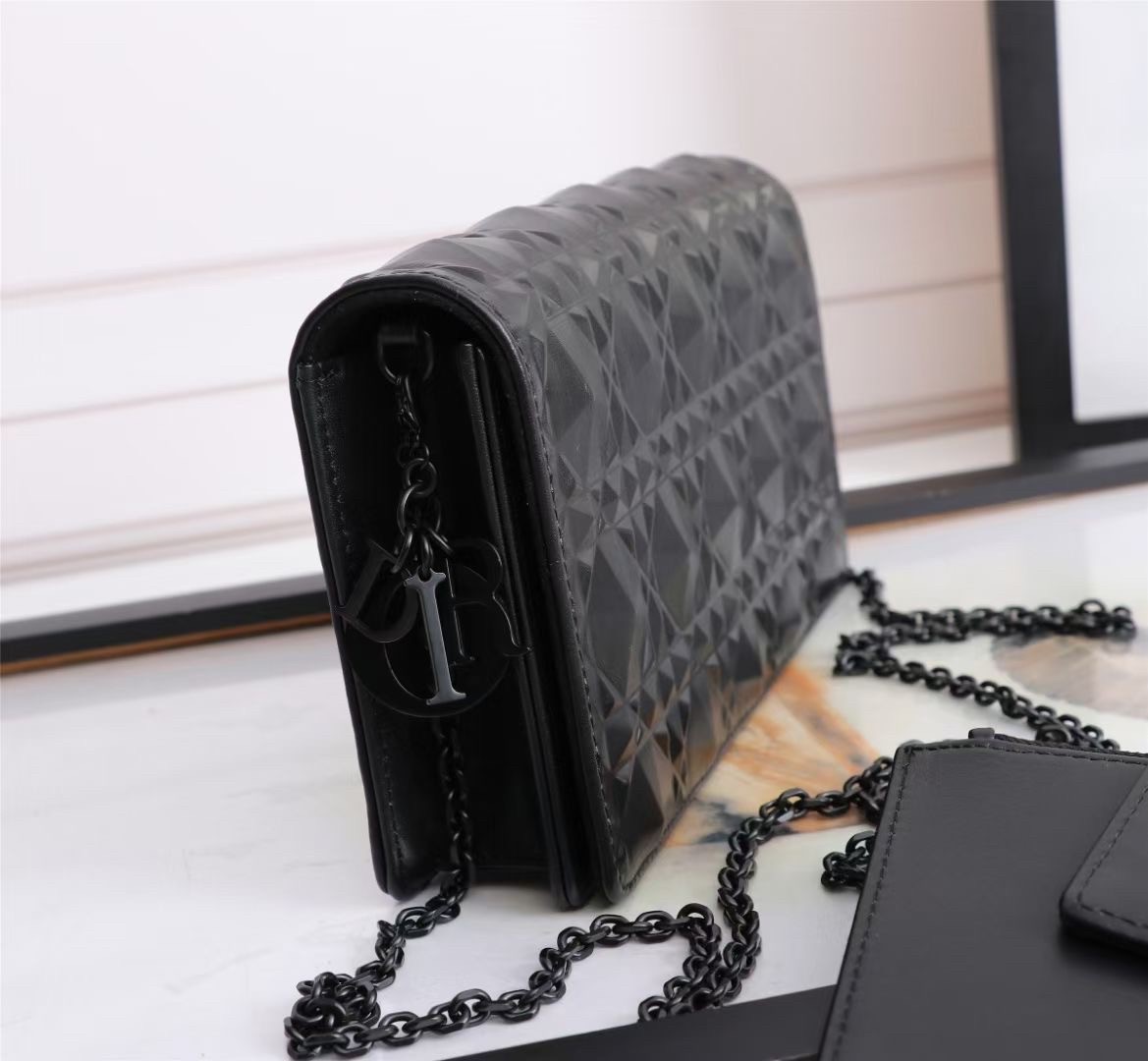 d*or lady d*or pouch in black Di*m*nd calfskin