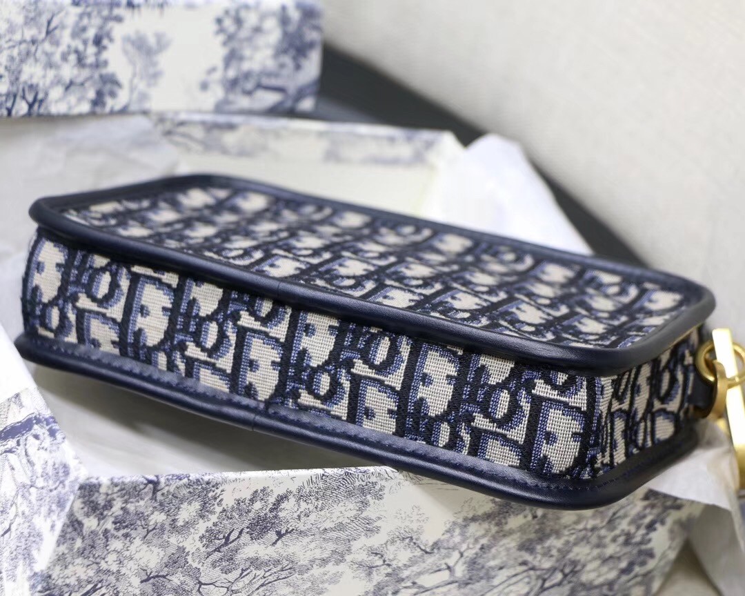 D*or D*orquake clutch in blue D*or oblique canvas