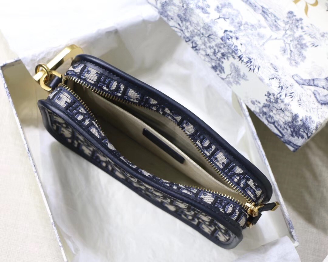 D*or D*orquake clutch in blue D*or oblique canvas