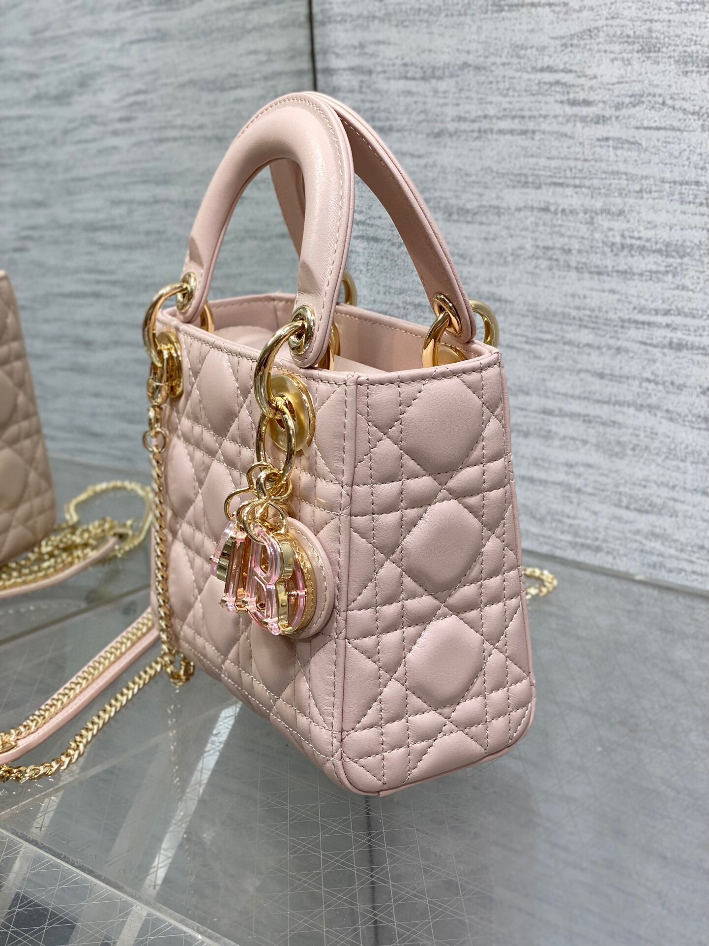 D*or lady D*or mini bag with chain in pink lambskin with resin charms