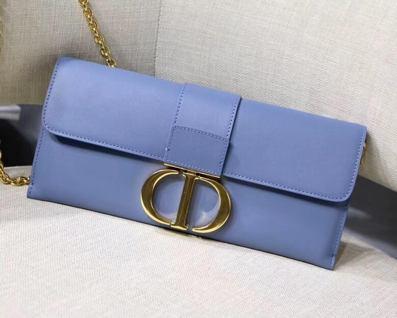 D*or 30 montaigne clutch bag in denim blue calfskin