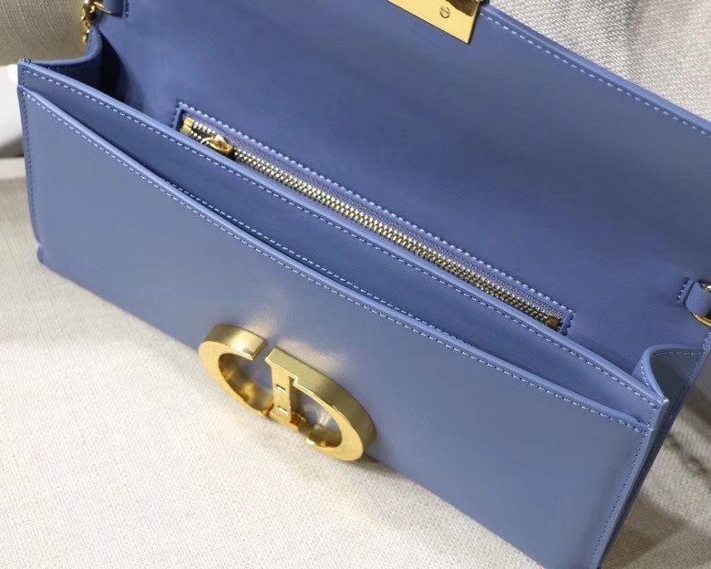 D*or 30 montaigne clutch bag in denim blue calfskin
