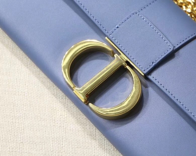 D*or 30 montaigne clutch bag in denim blue calfskin