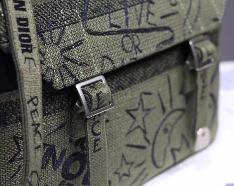 D*or D*orcamp messenger bag in green embroidered canvas