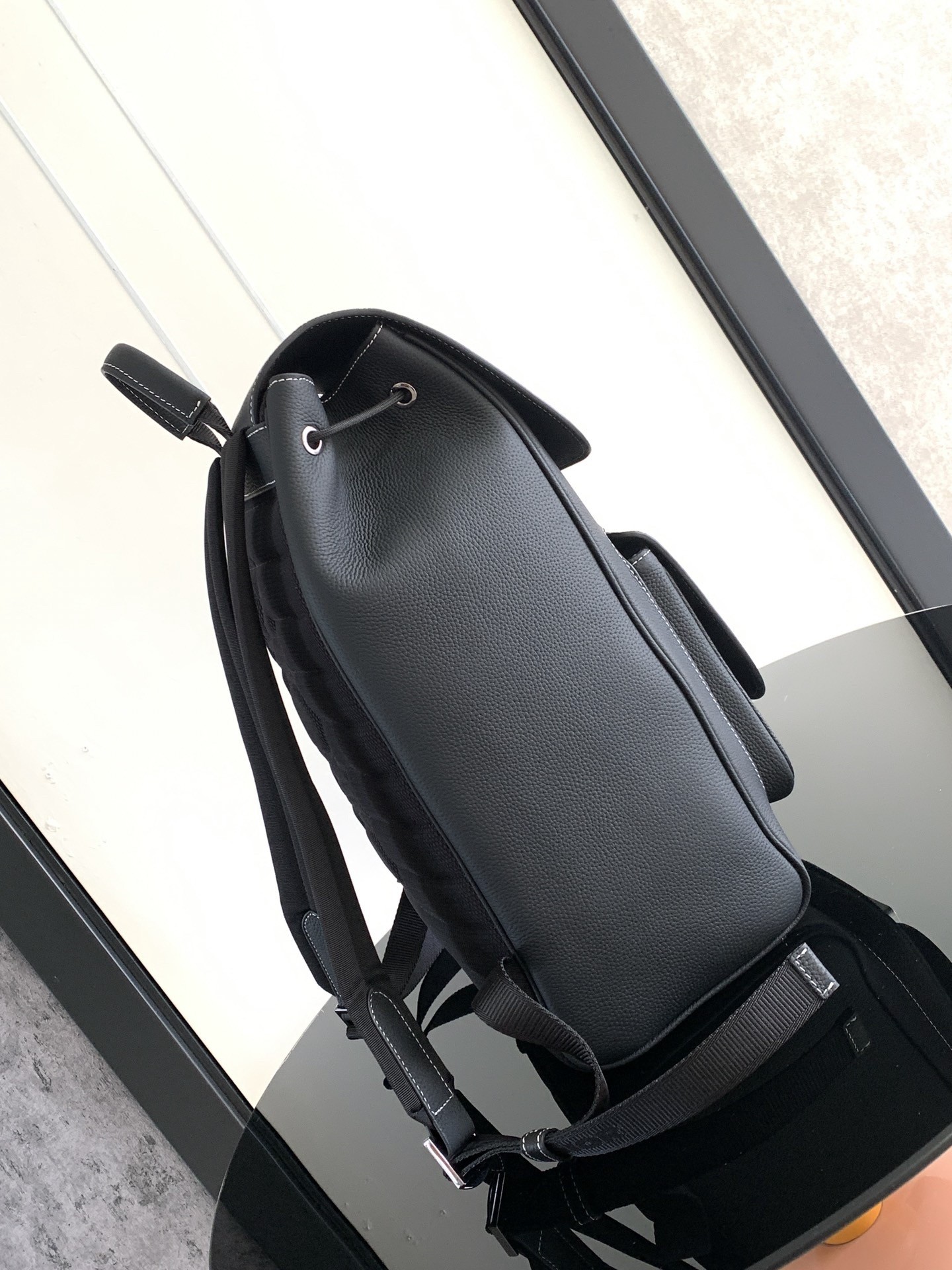 D*or saddle backpack with flap in black grained calfskin