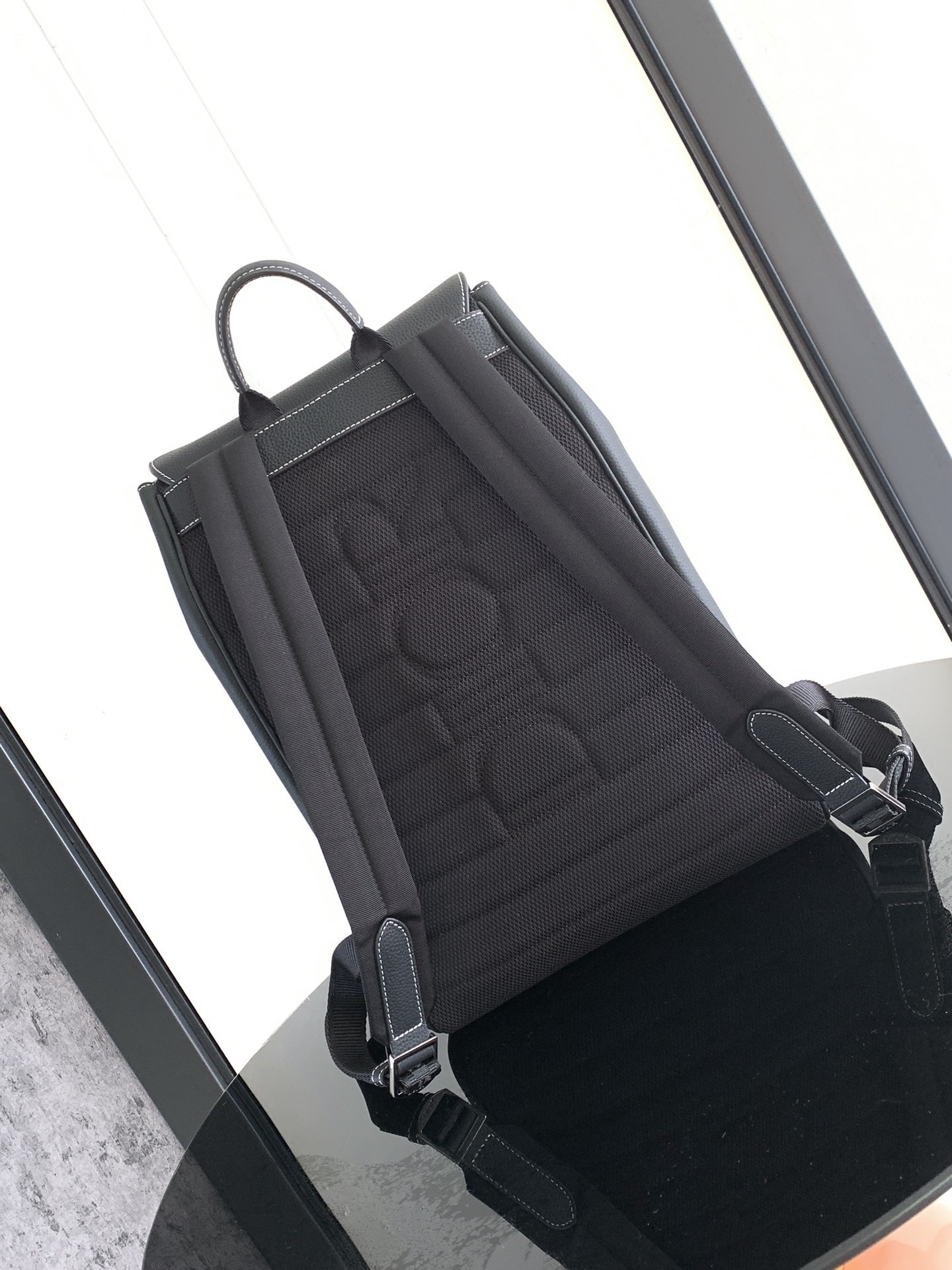 D*or saddle backpack with flap in black grained calfskin