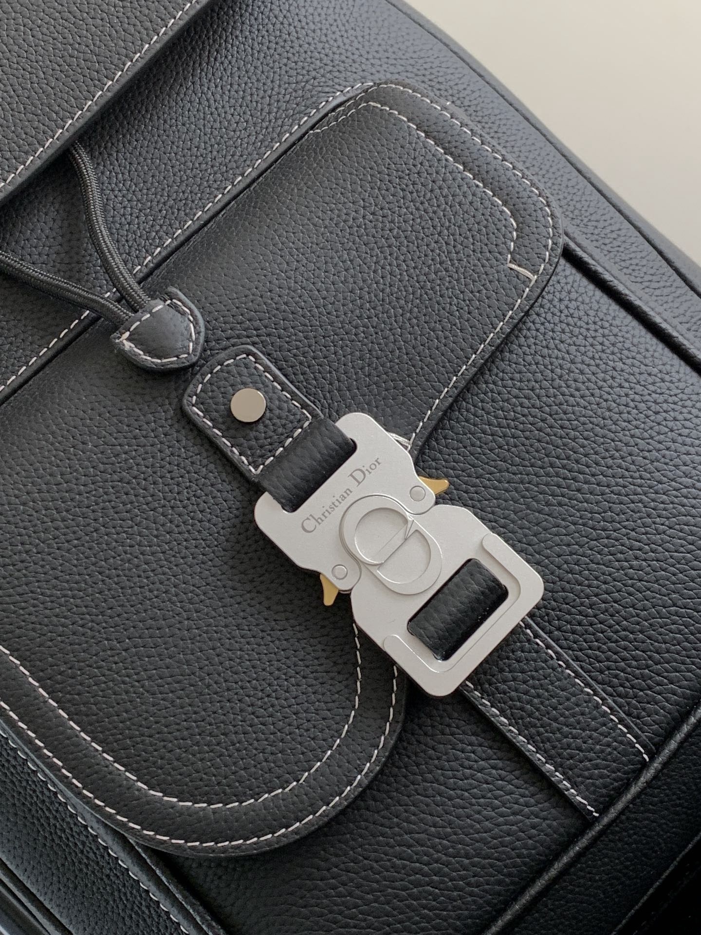 D*or saddle backpack with flap in black grained calfskin