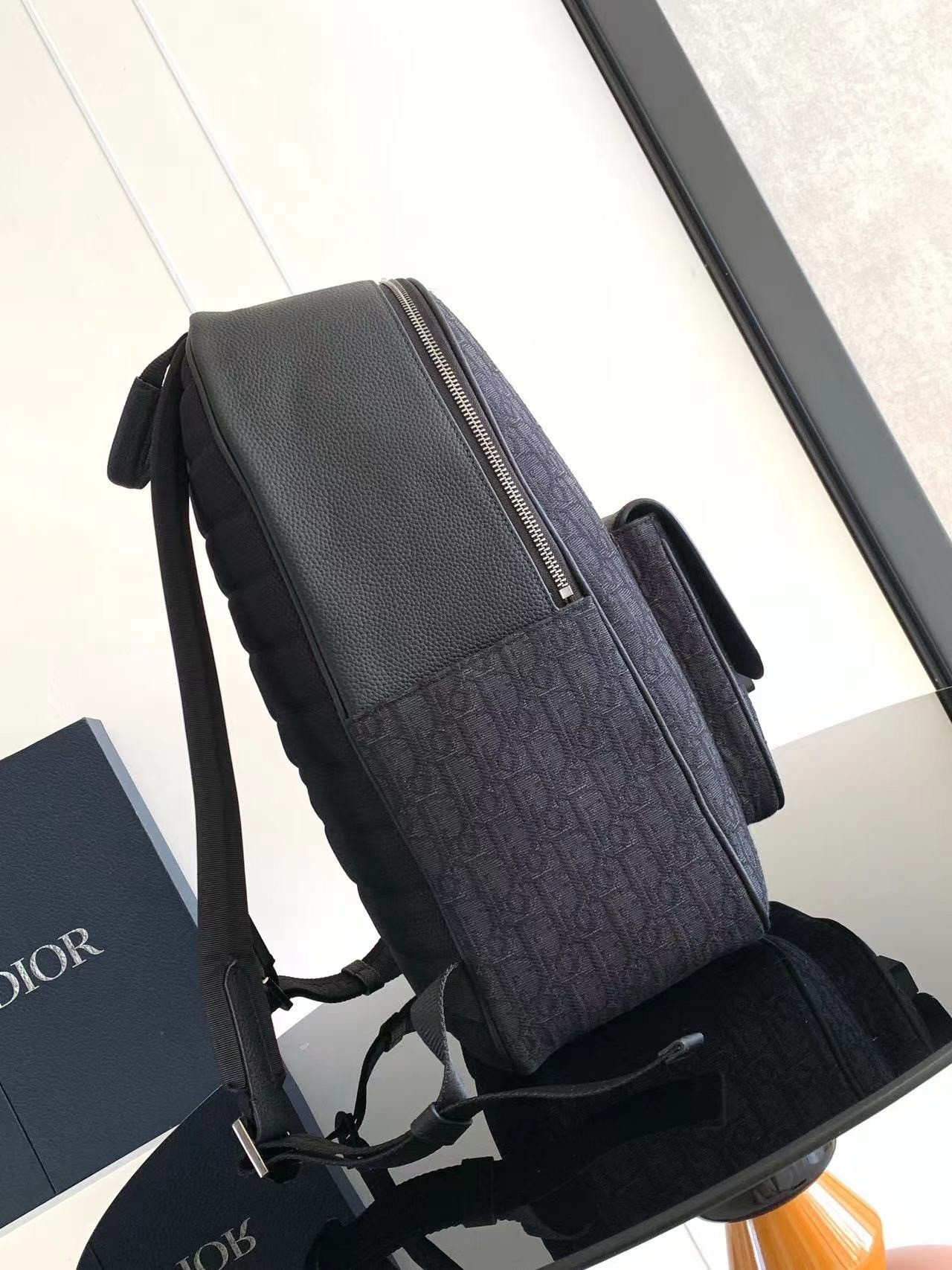 D*or saddle zip backpack in black oblique jacquard