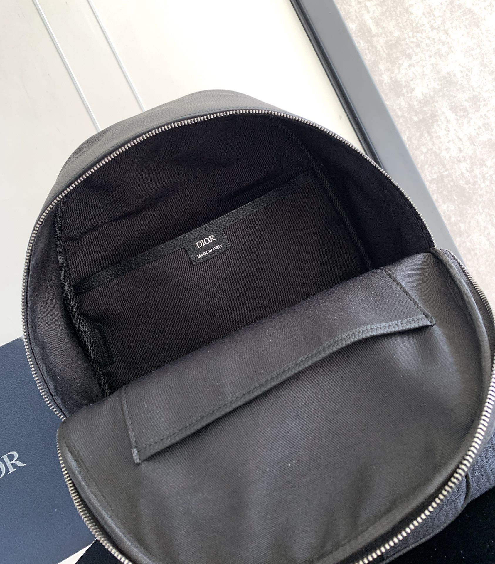 D*or saddle zip backpack in black oblique jacquard