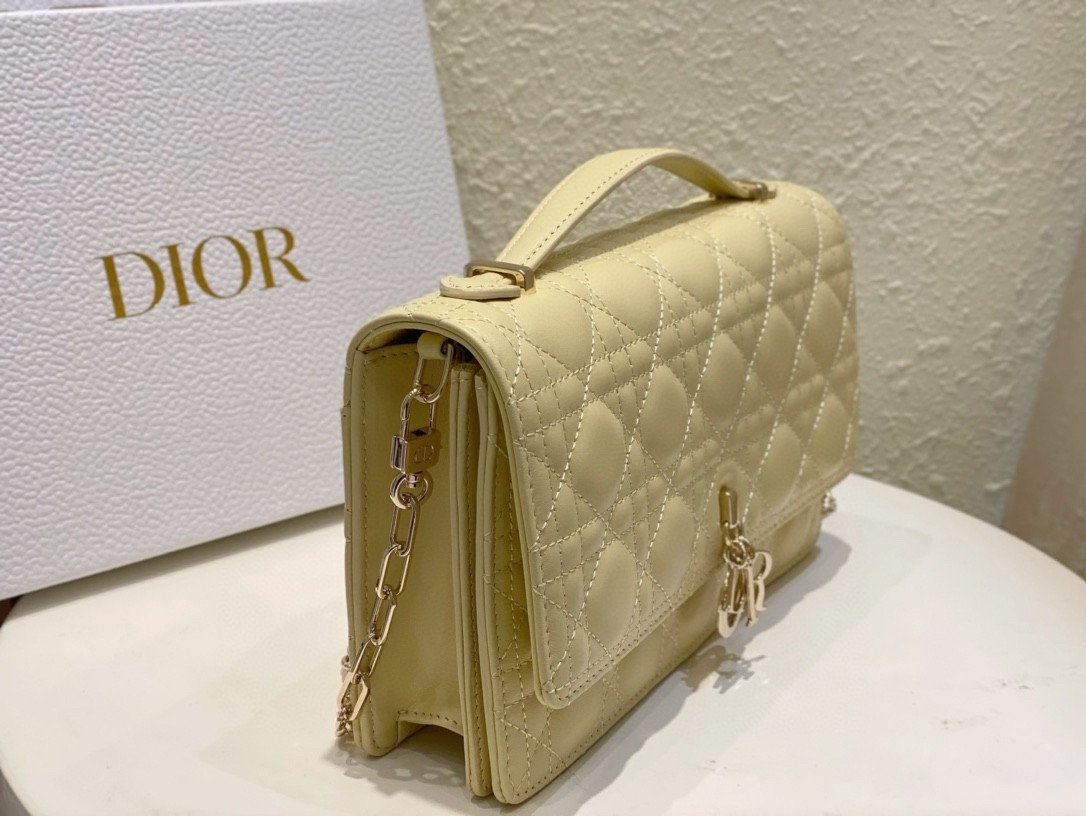 D*or miss D*or top handle bag in pastel yellow cannage lambskin