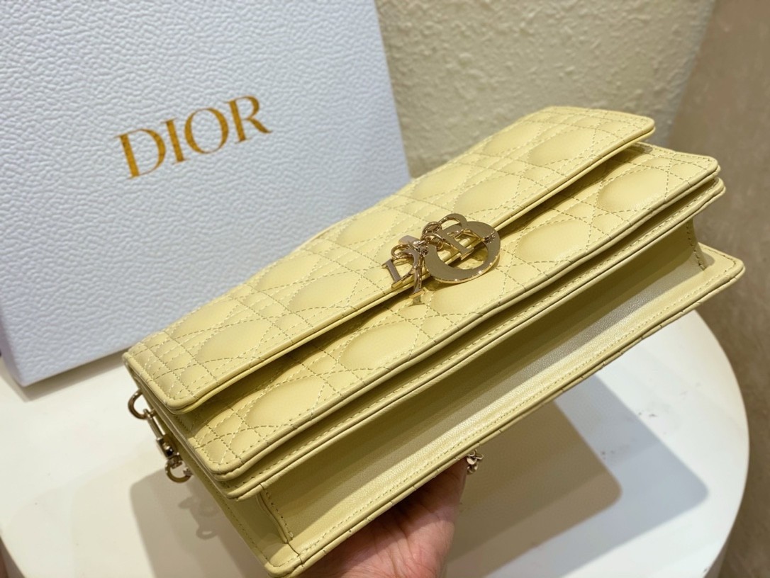 D*or miss D*or top handle bag in pastel yellow cannage lambskin
