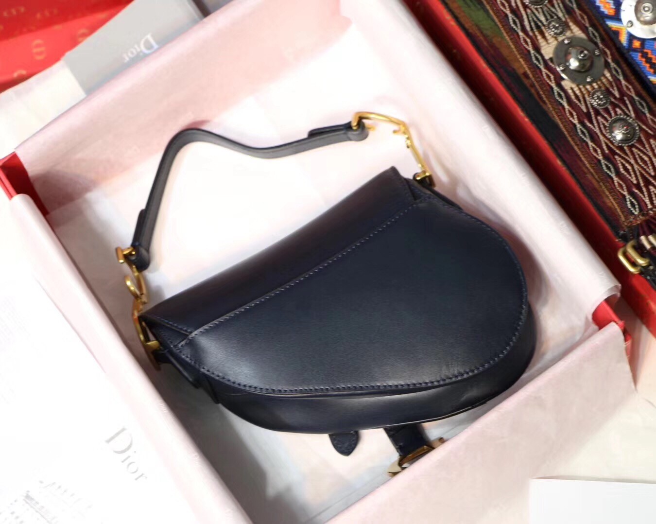 D*or mini saddle bag in blue calfskin
