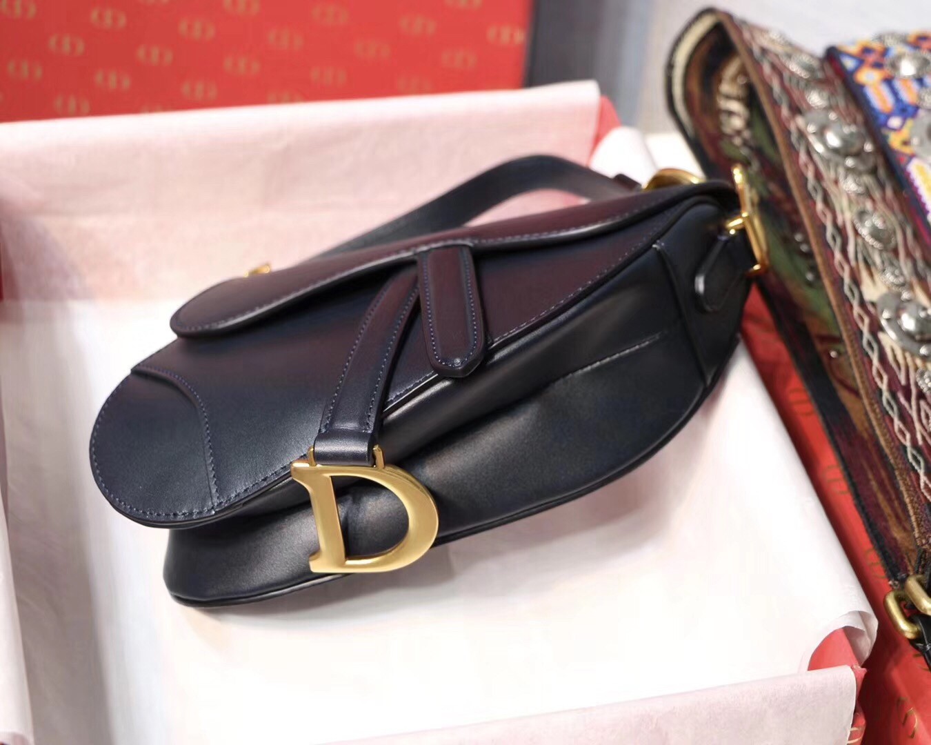 D*or mini saddle bag in blue calfskin