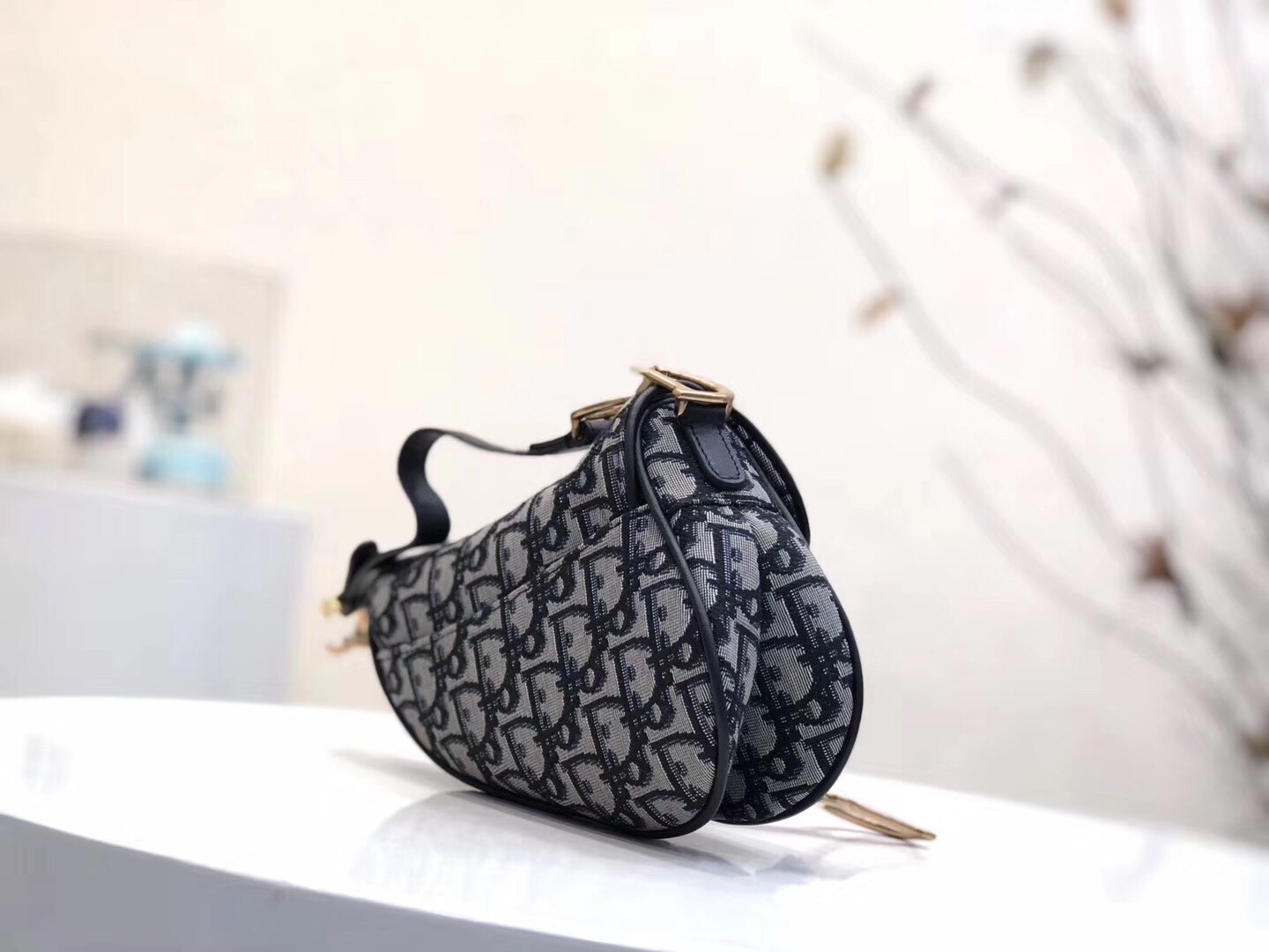 D*or mini saddle bag in blue oblique jacquard canvas
