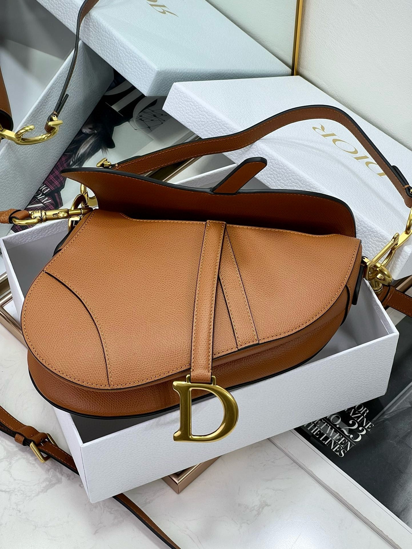 D*or saddle bag with strap in brown grained calfskin
