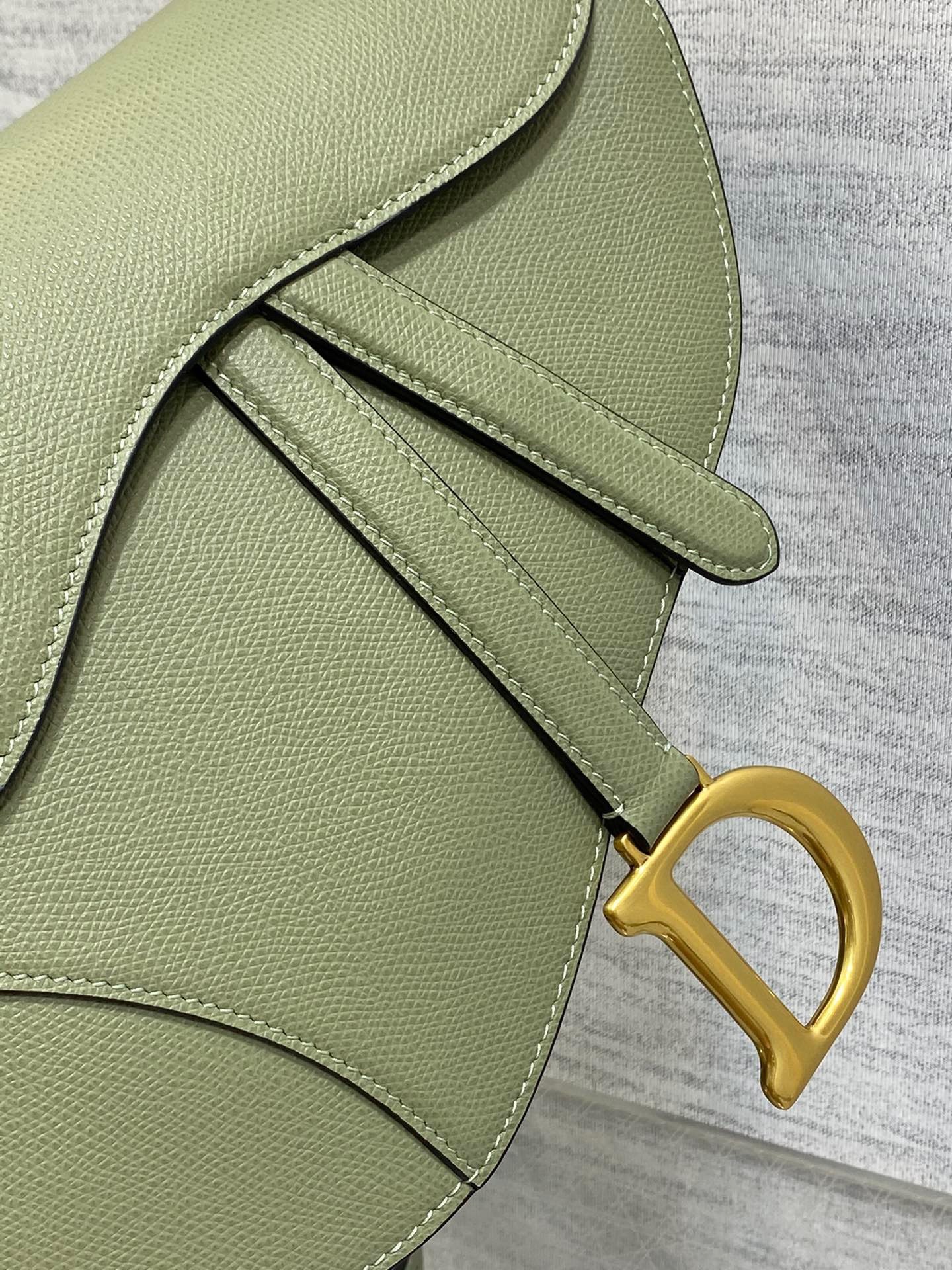 D*or saddle bag with strap in ethereal green grained calfskin