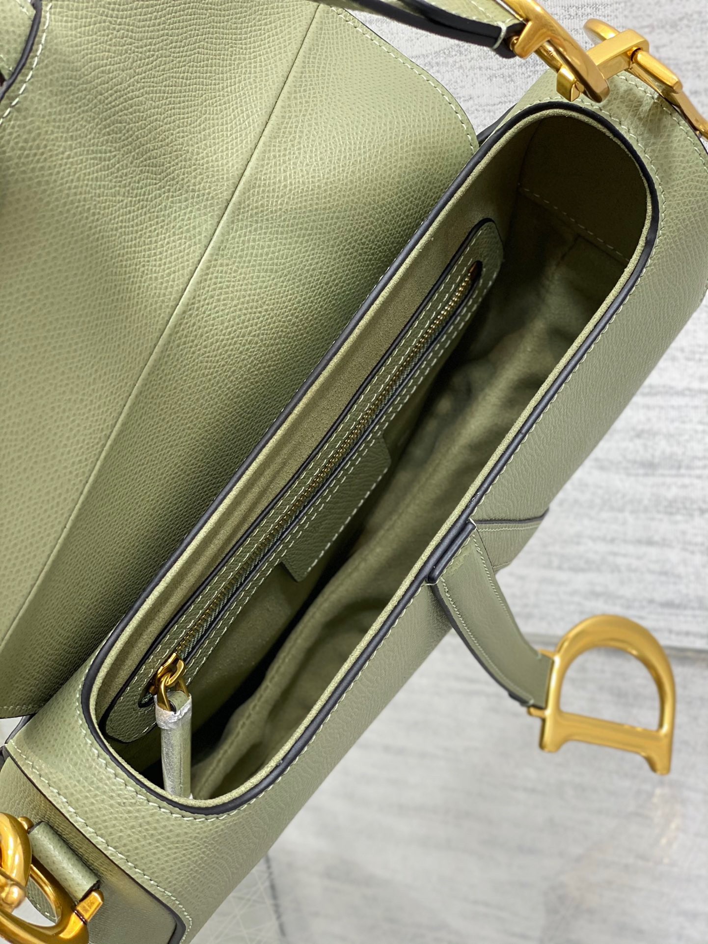 D*or saddle bag with strap in ethereal green grained calfskin