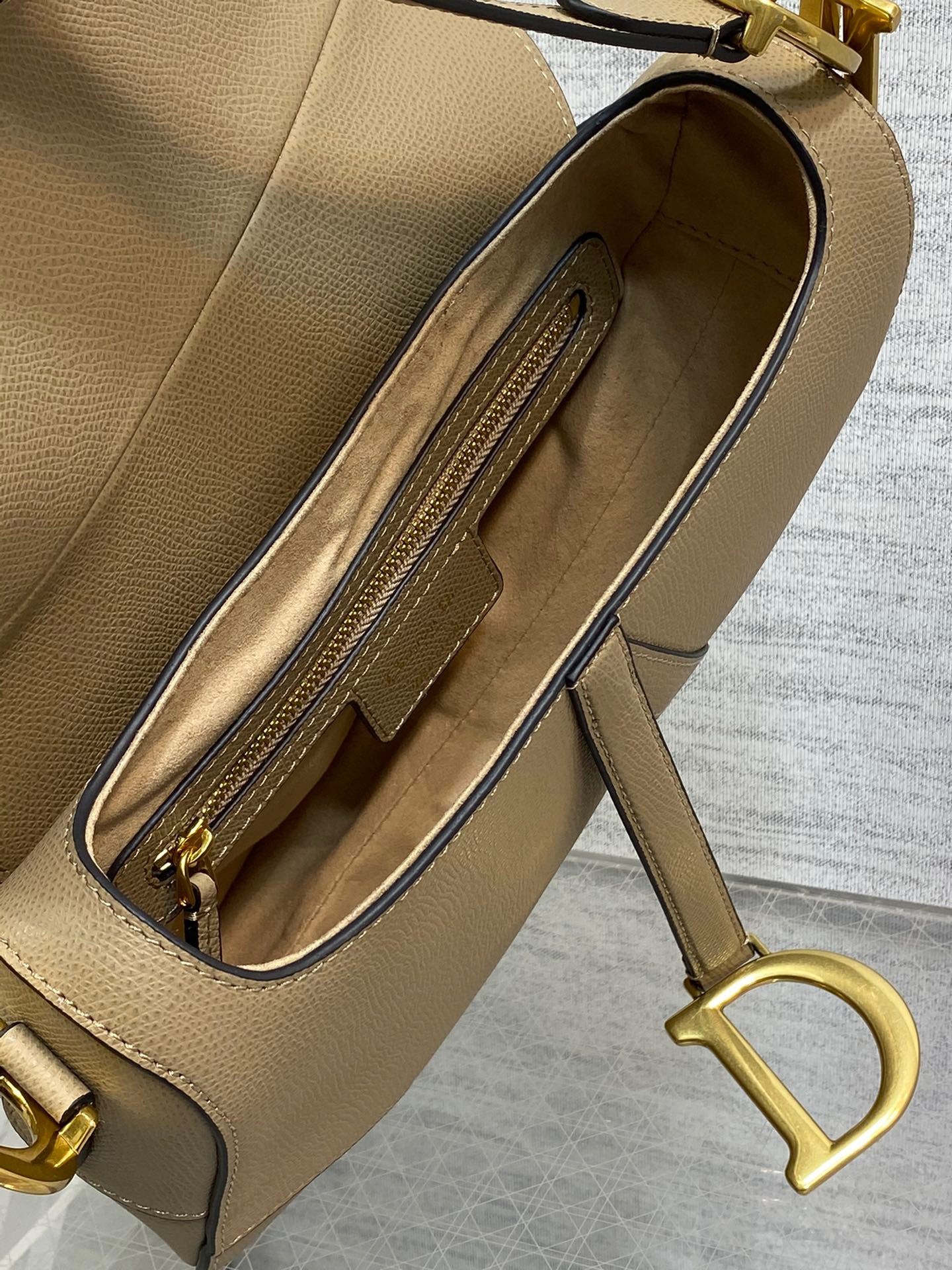 D*or saddle bag with strap in sand grained calfskin