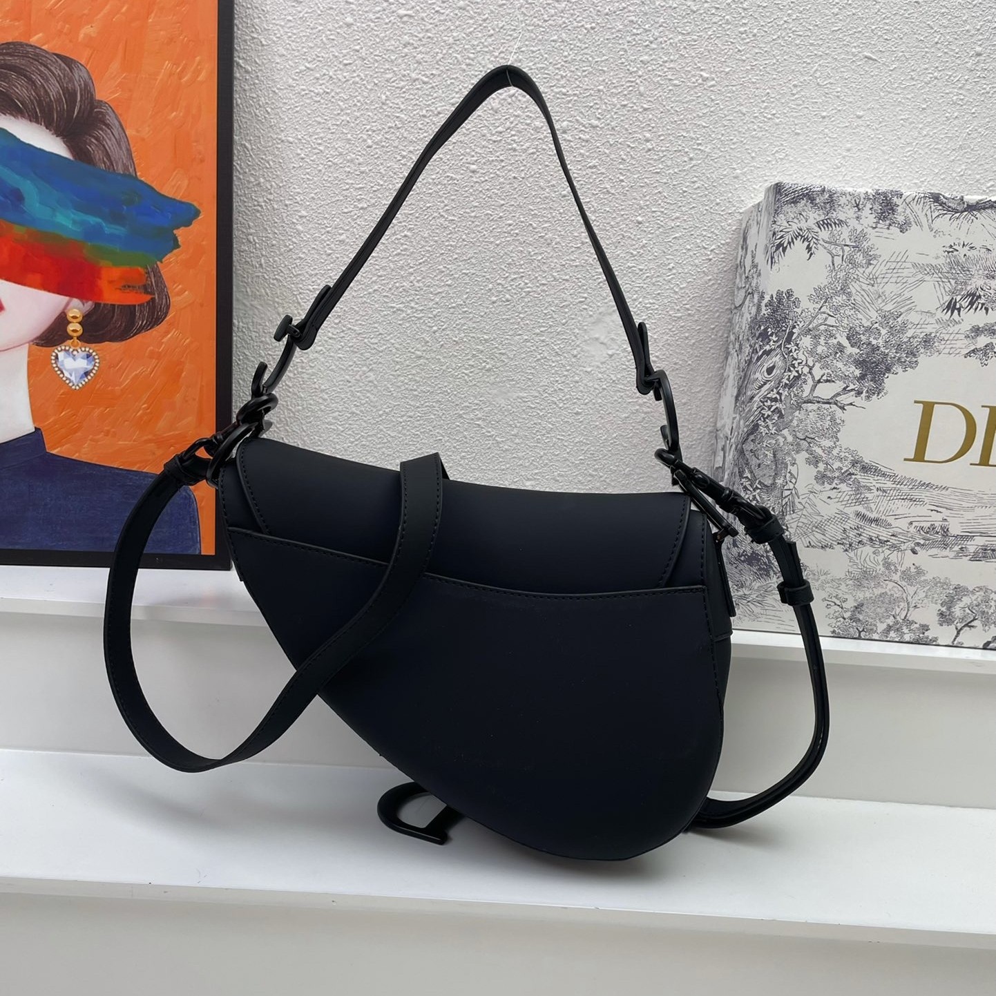 D*or saddle bag with strap in black ultramatte calfskin
