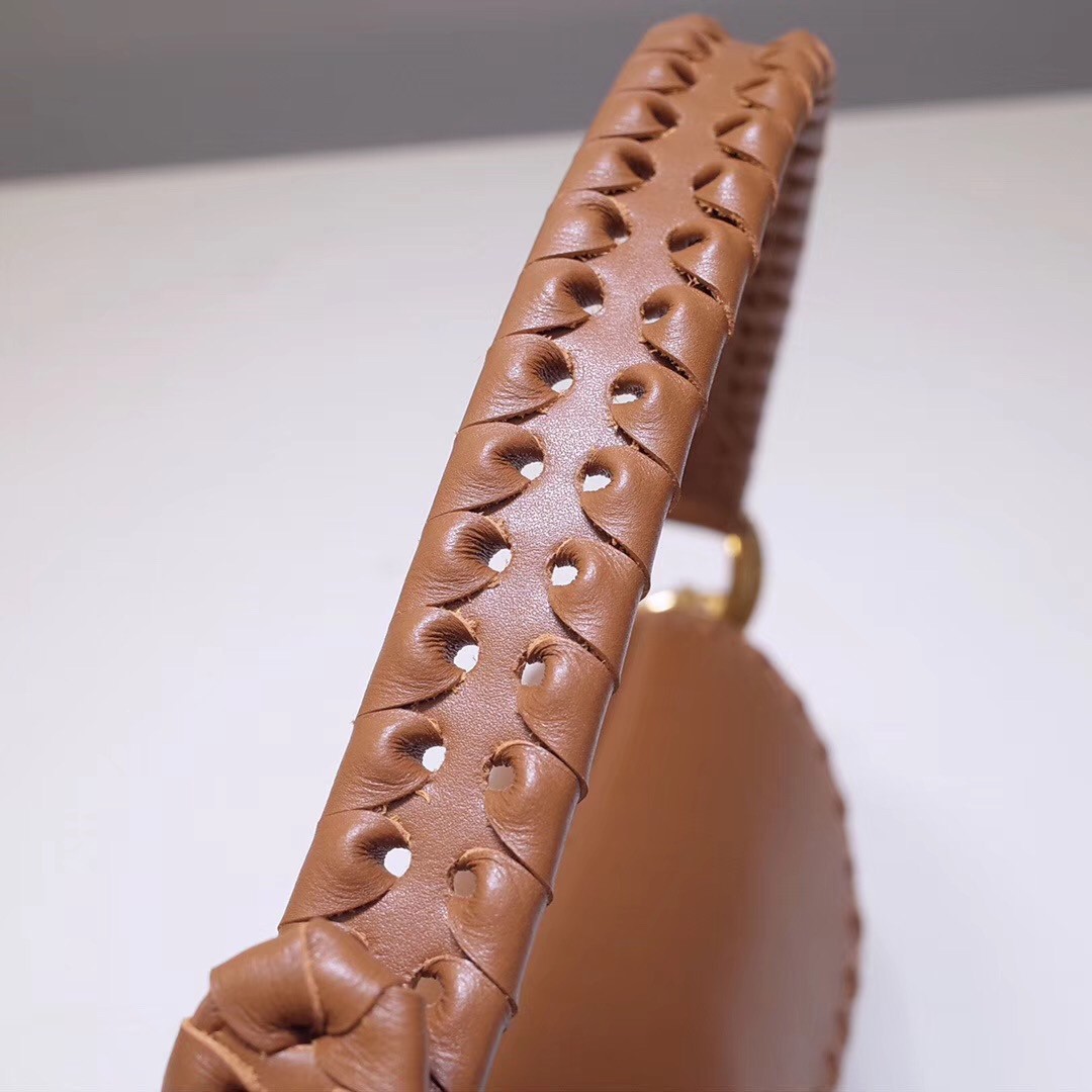 D*or saddle bag in brown calfskin with threaded edges