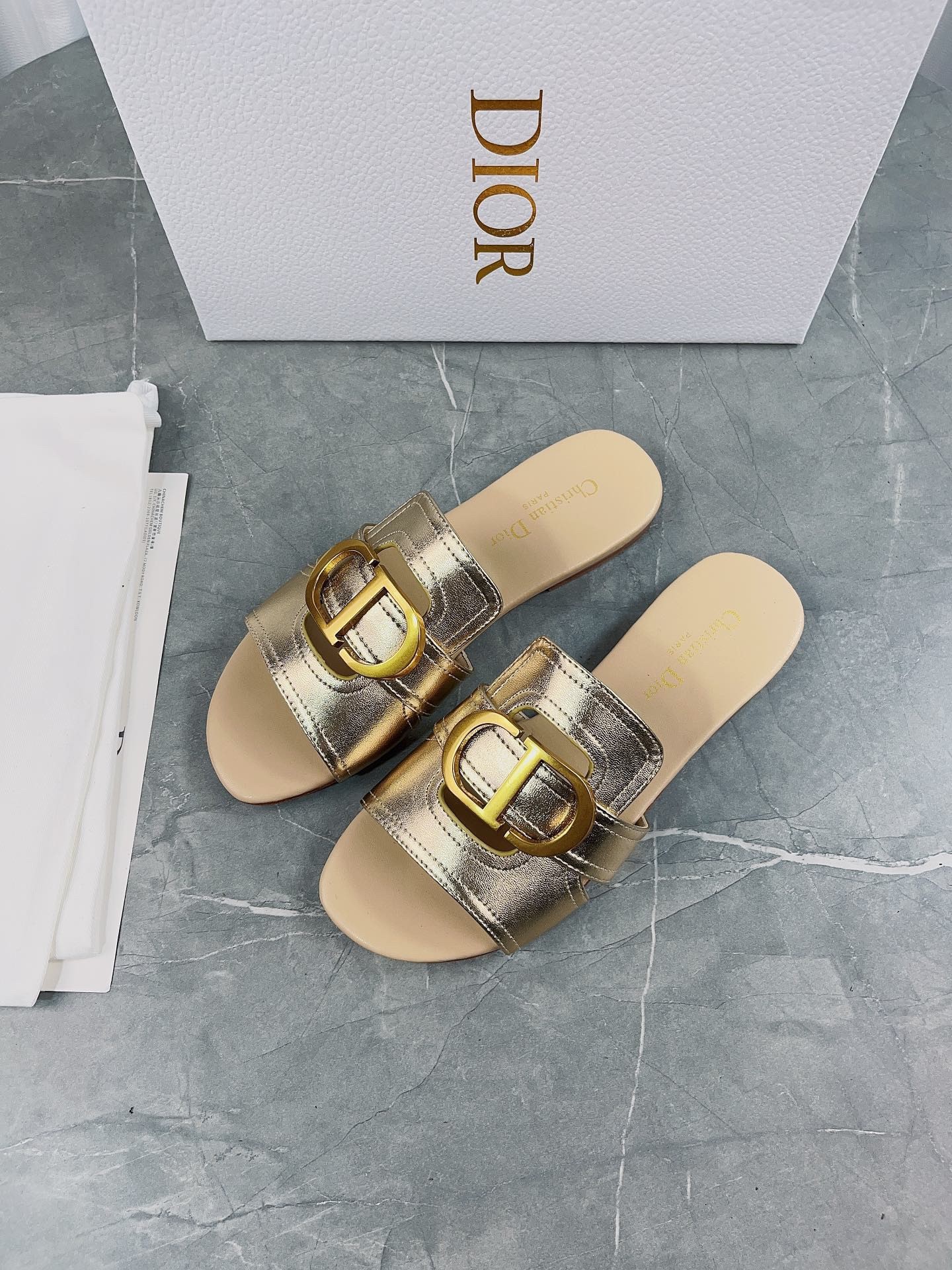 D*or 30 montaigne slides in gold metallic calfskin