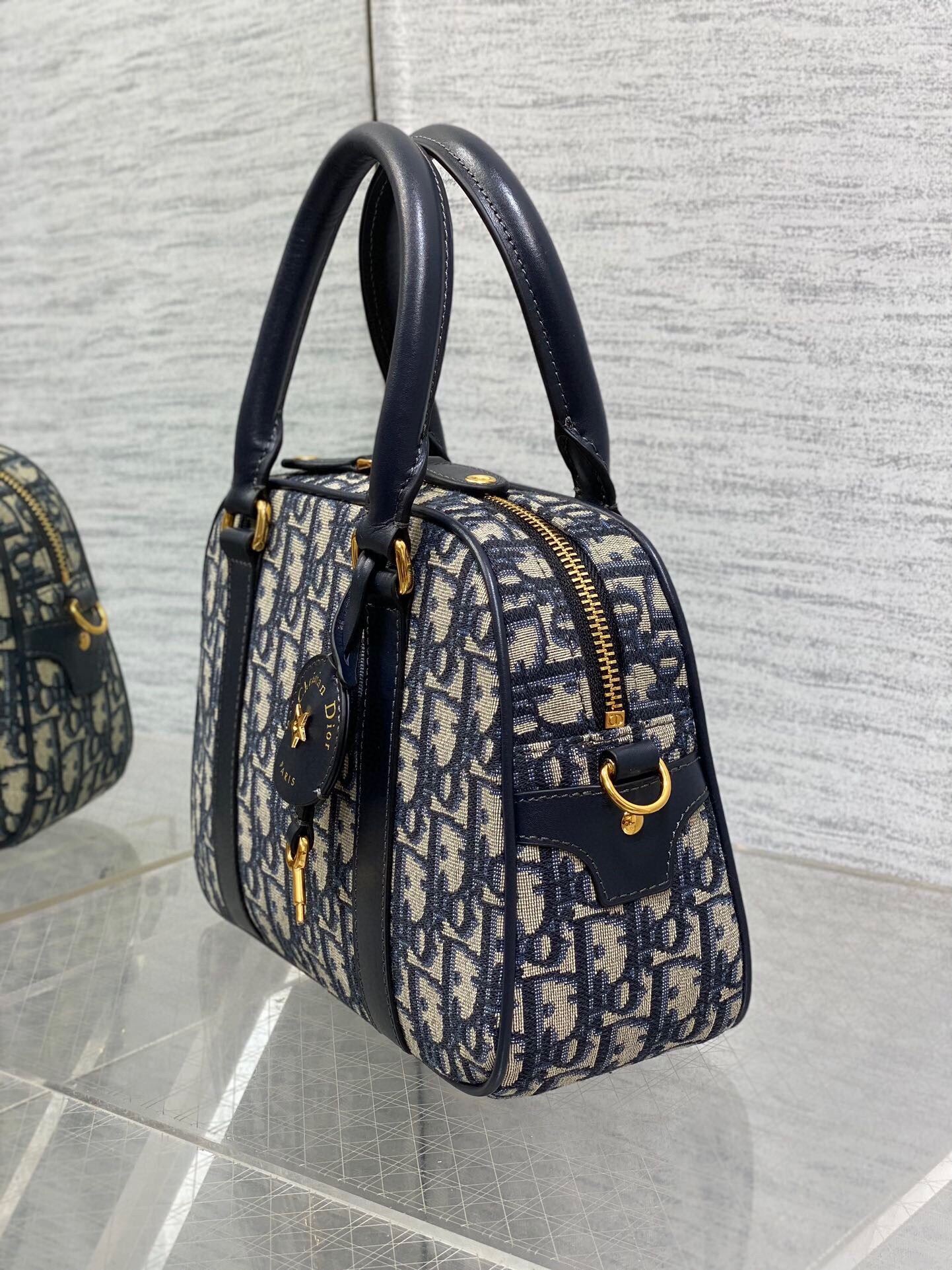 D*or d-vibe bowling medium bag in blue oblique jacquard
