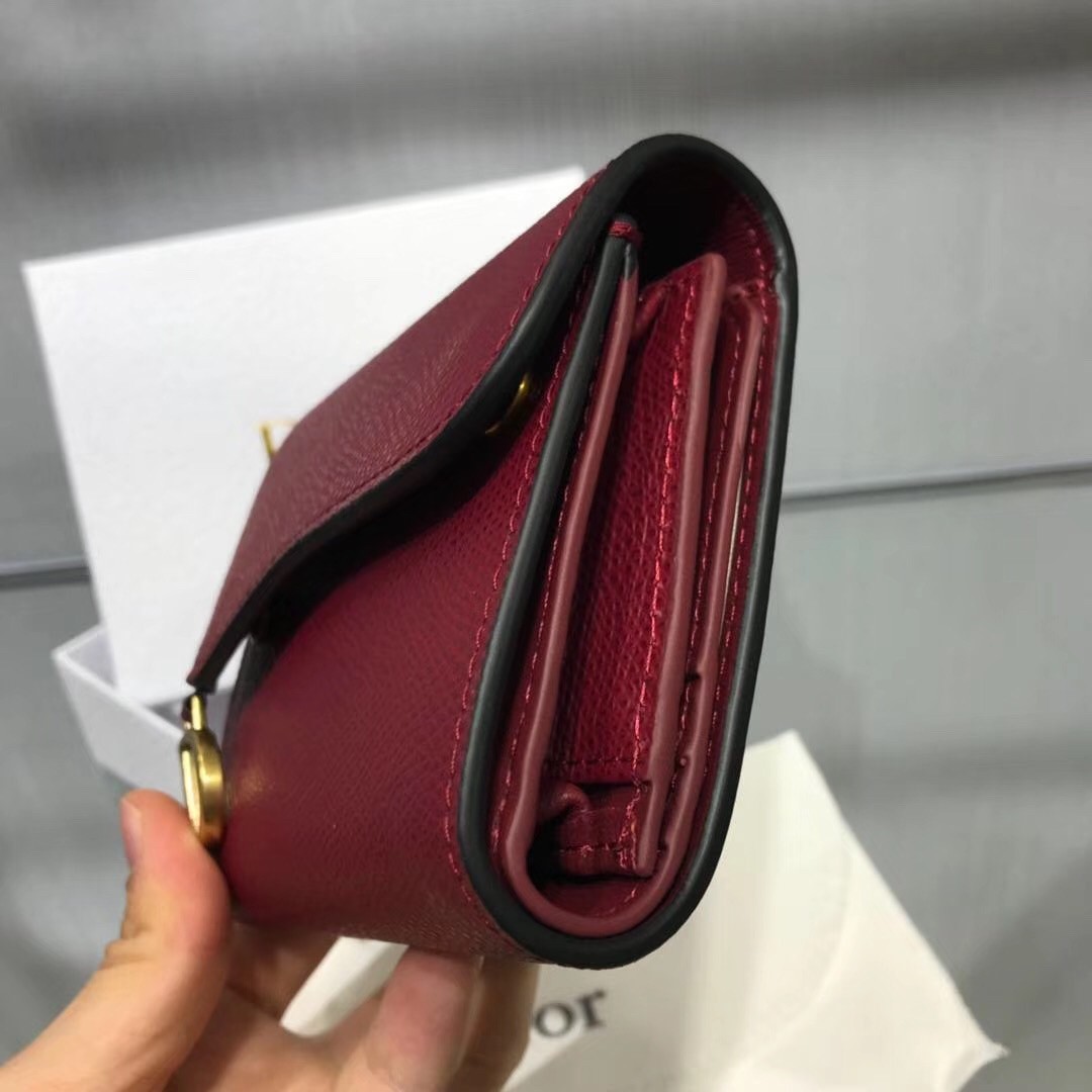 D*or mini saddle tri-fold wallet in scarlet red calfskin