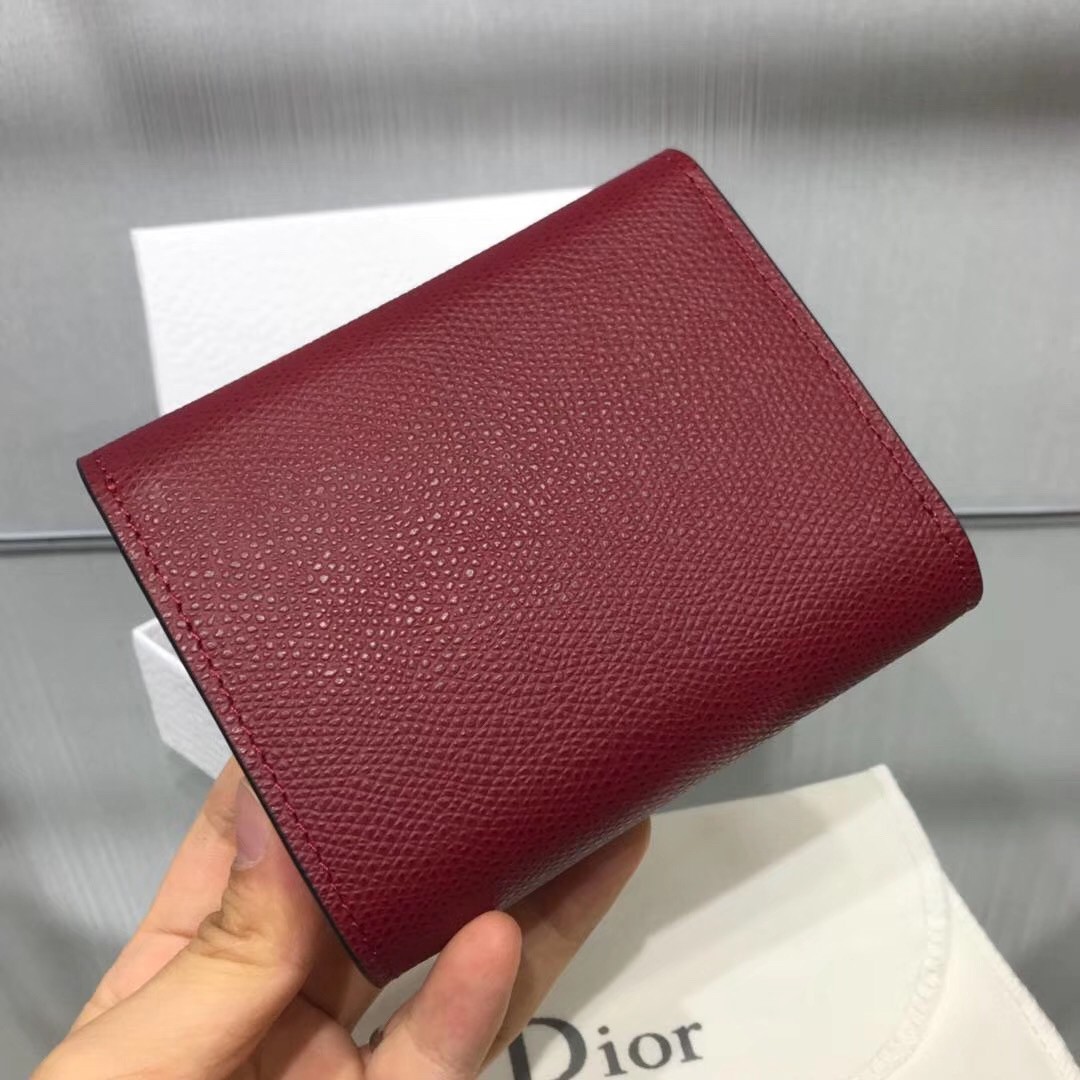 D*or mini saddle tri-fold wallet in scarlet red calfskin