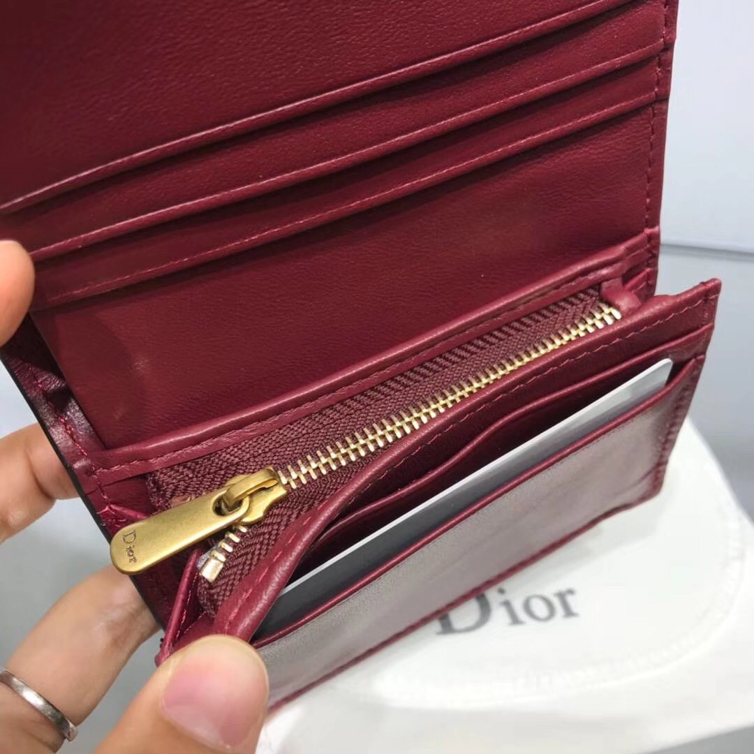 D*or mini saddle tri-fold wallet in scarlet red calfskin