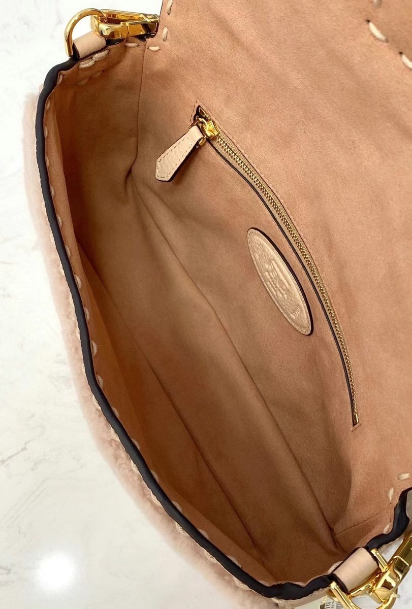 F**di medium baguette bag in beige shearling
