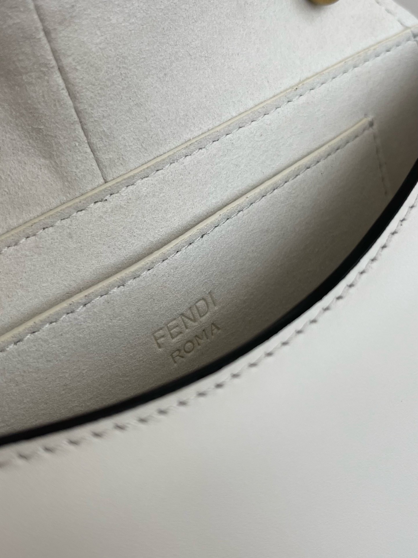 F**di c’mon small bag in white calfskin