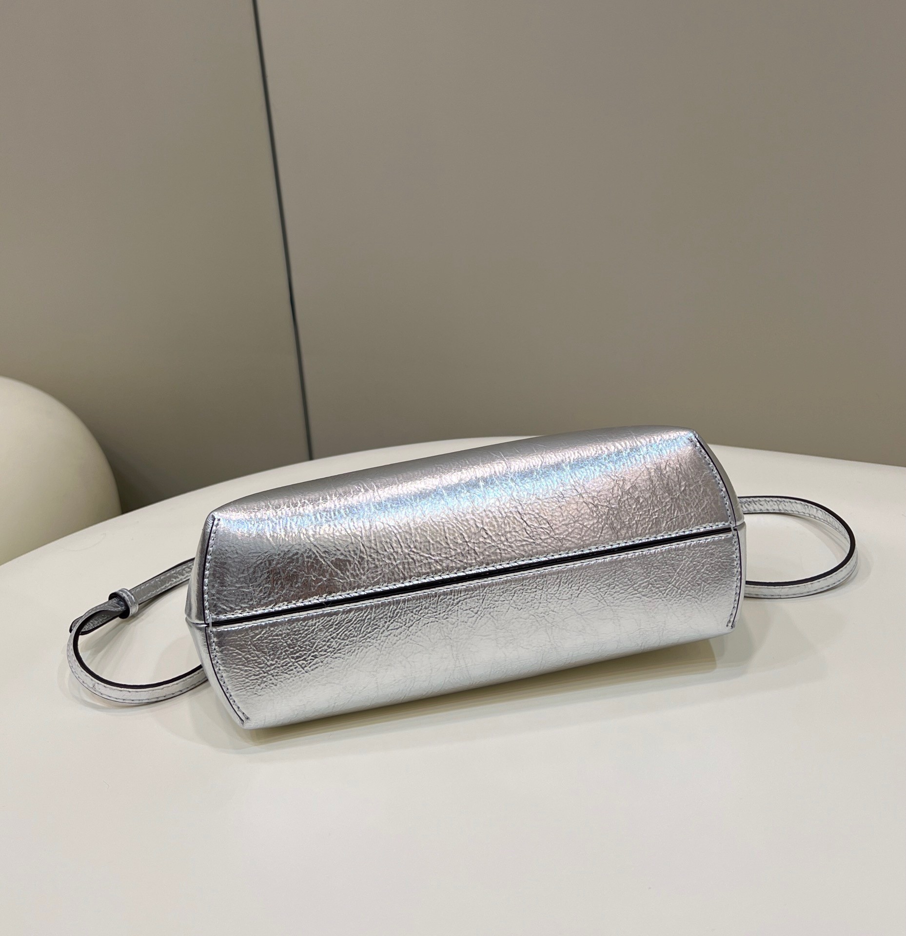 F**di first small bag in silver laminated leather