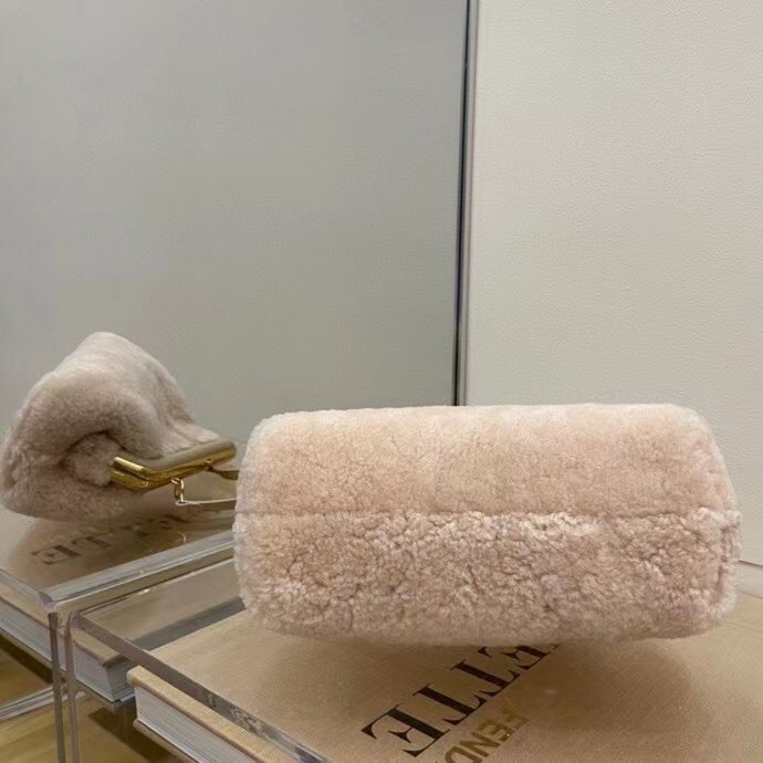 F**di small first bag in pink wool sheepskin