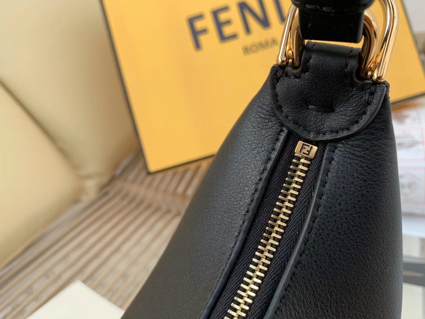 F**di F**digraphy small hobo bag in black leather
