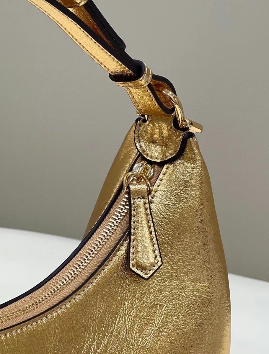 F**di F**digraphy small hobo bag in gold laminated leather