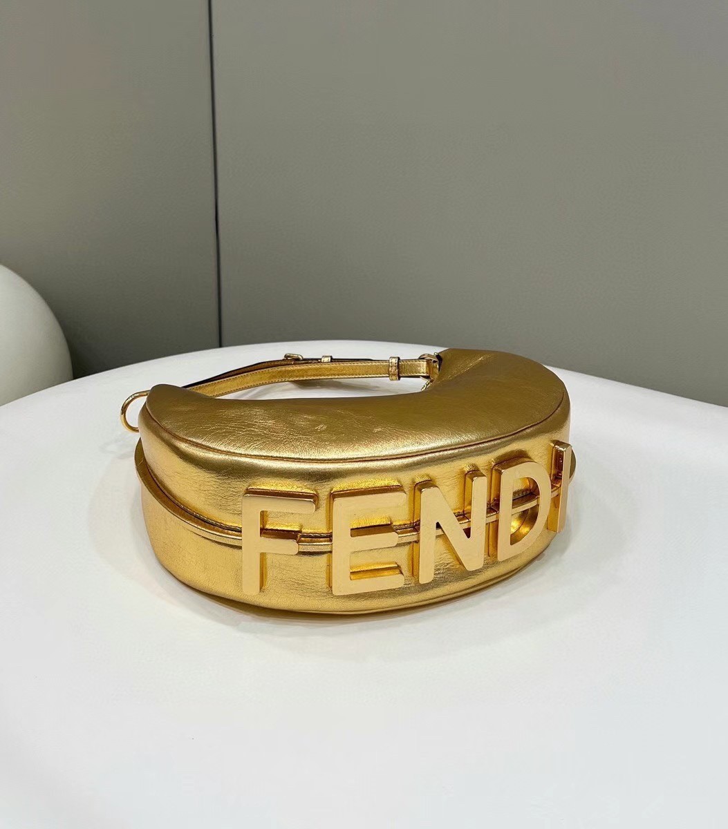 F**di F**digraphy small hobo bag in gold laminated leather