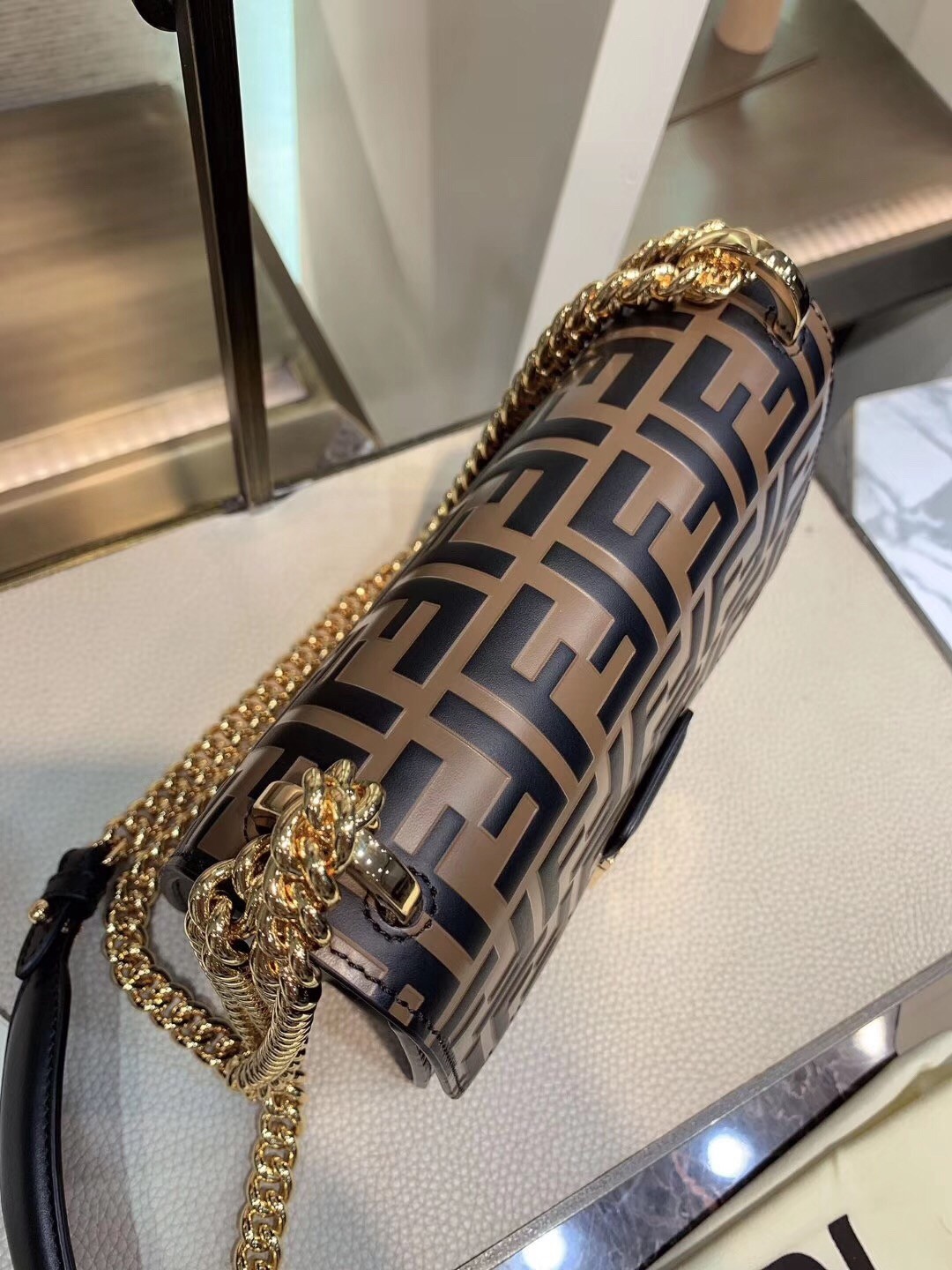 F**di small kan u bag in calfskin embossed with ff