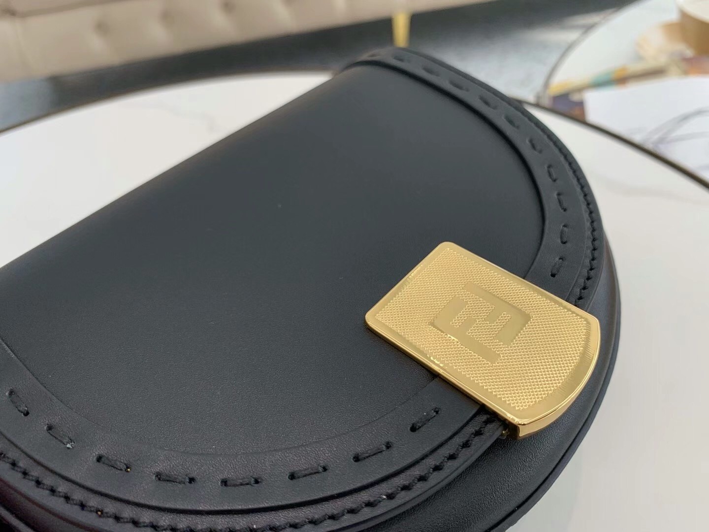 F**di moonlight saddle bag in black calfskin