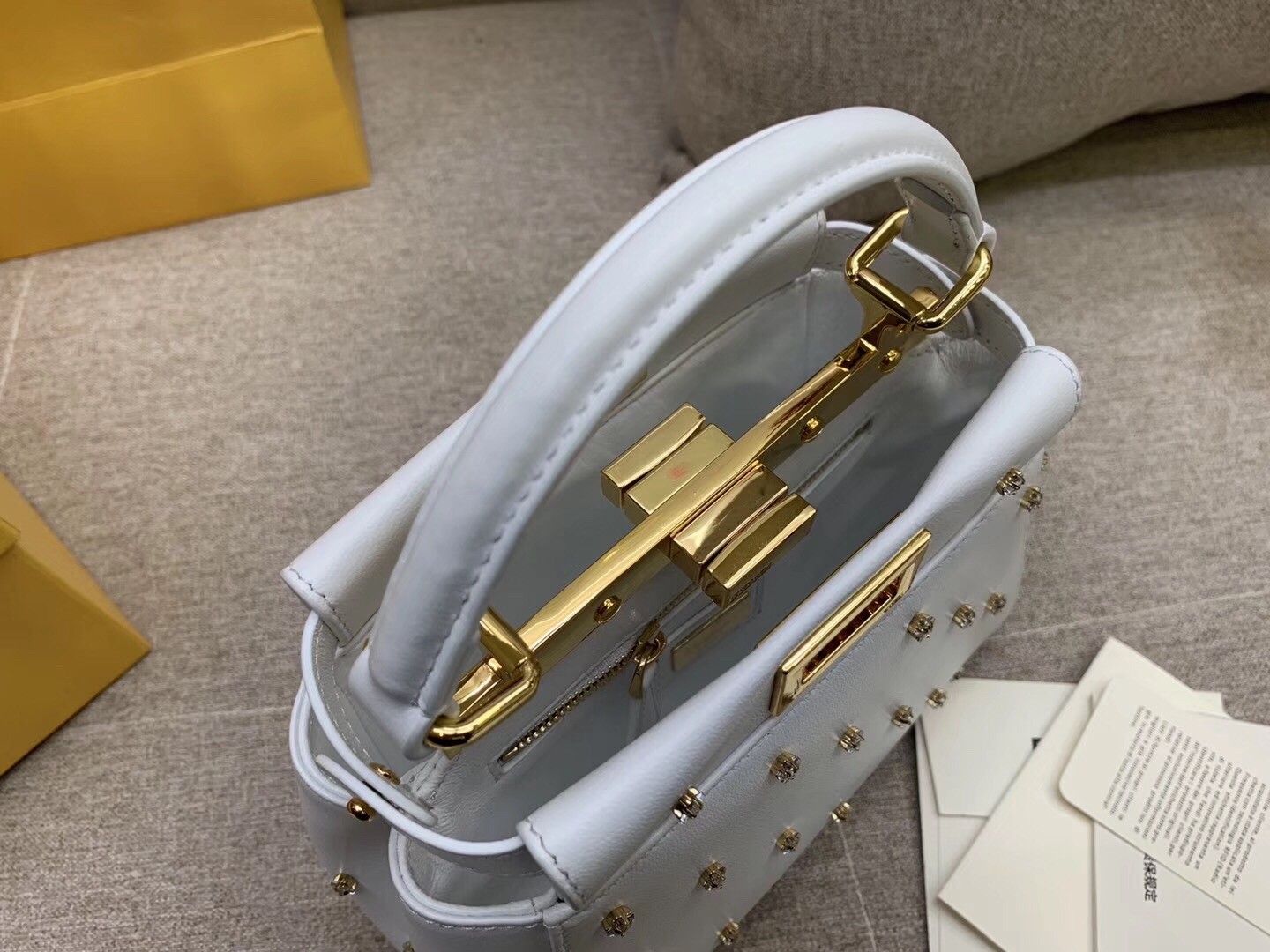 F**di peekaboo xs bag with star studs in white nappa leather