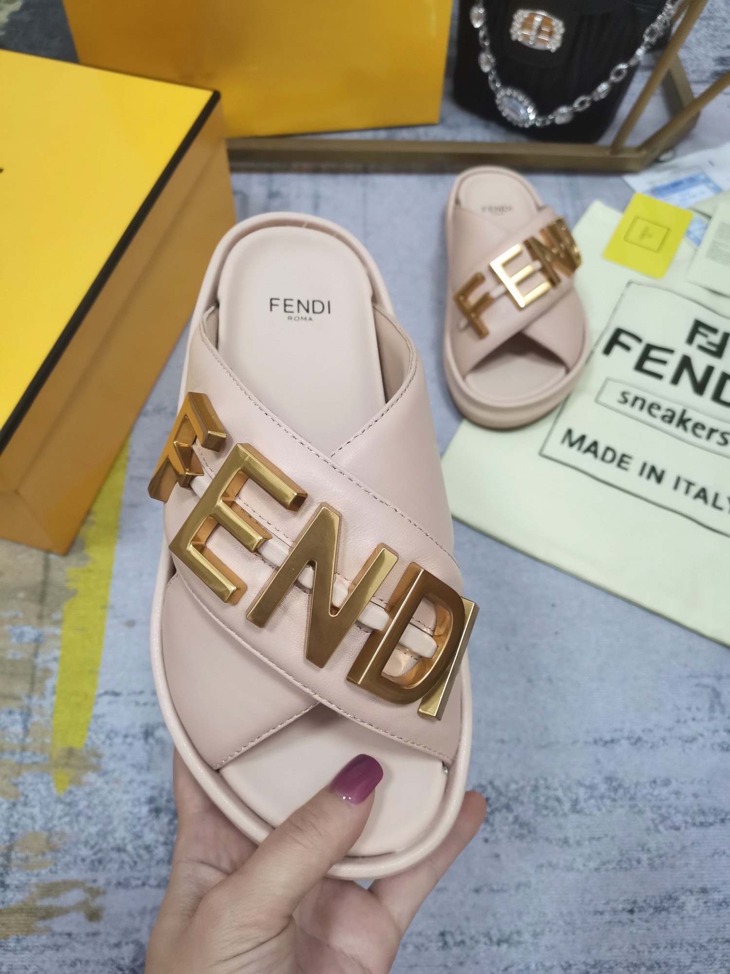 F**di F**digraphy slides in pink calfskin